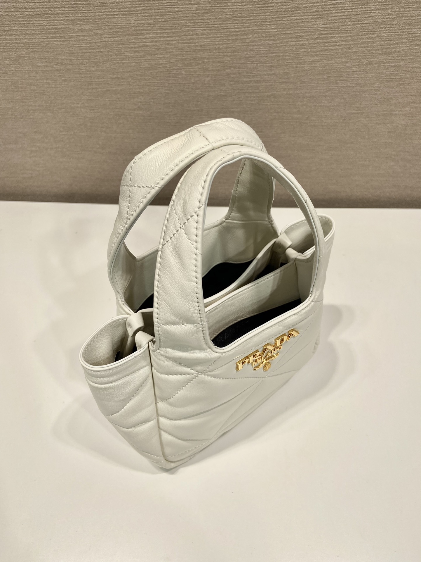 Pra*a small nappa-leather tote bag with topstitching