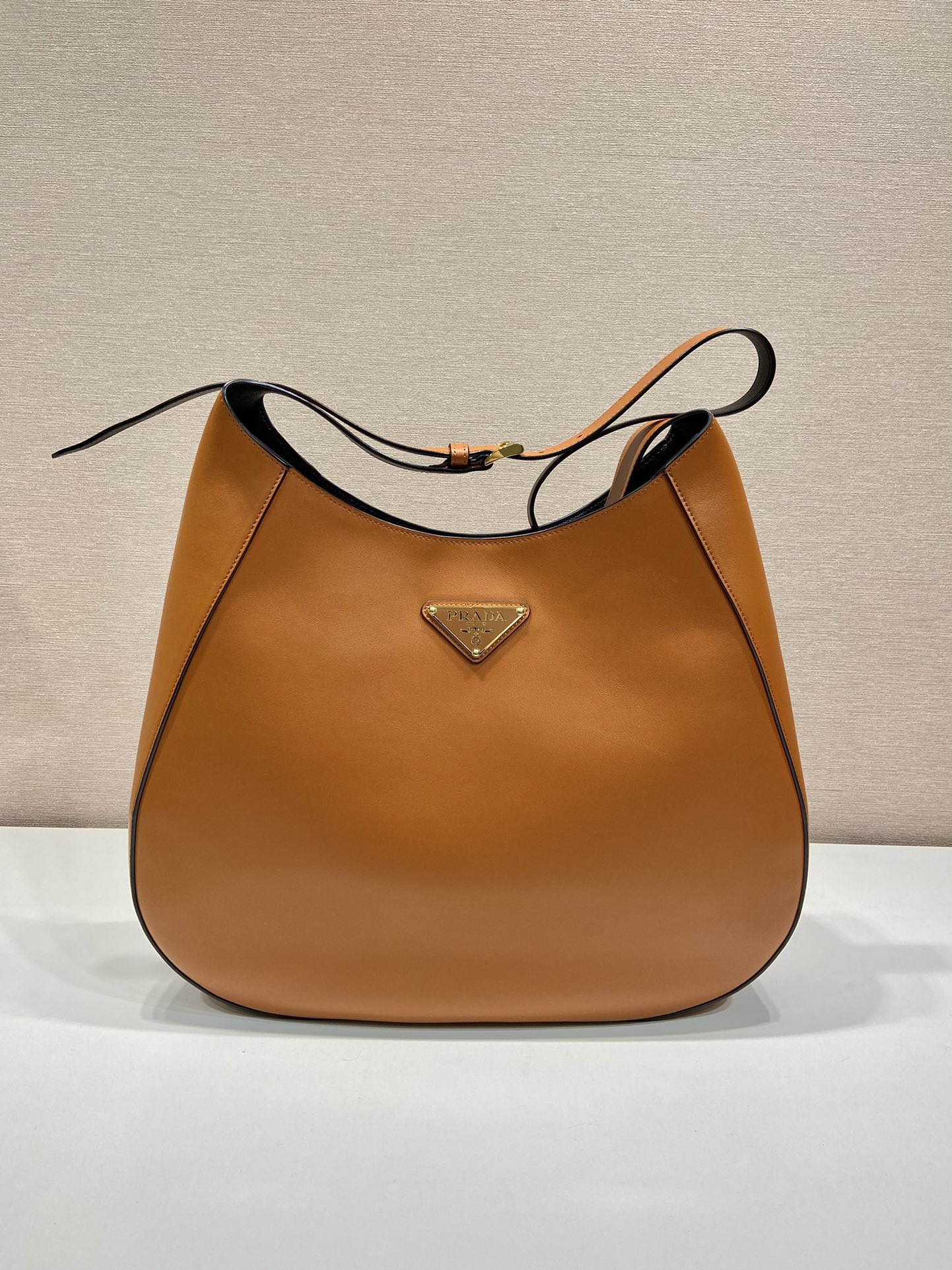 Pra*a large leather shoulder bag with topstitching