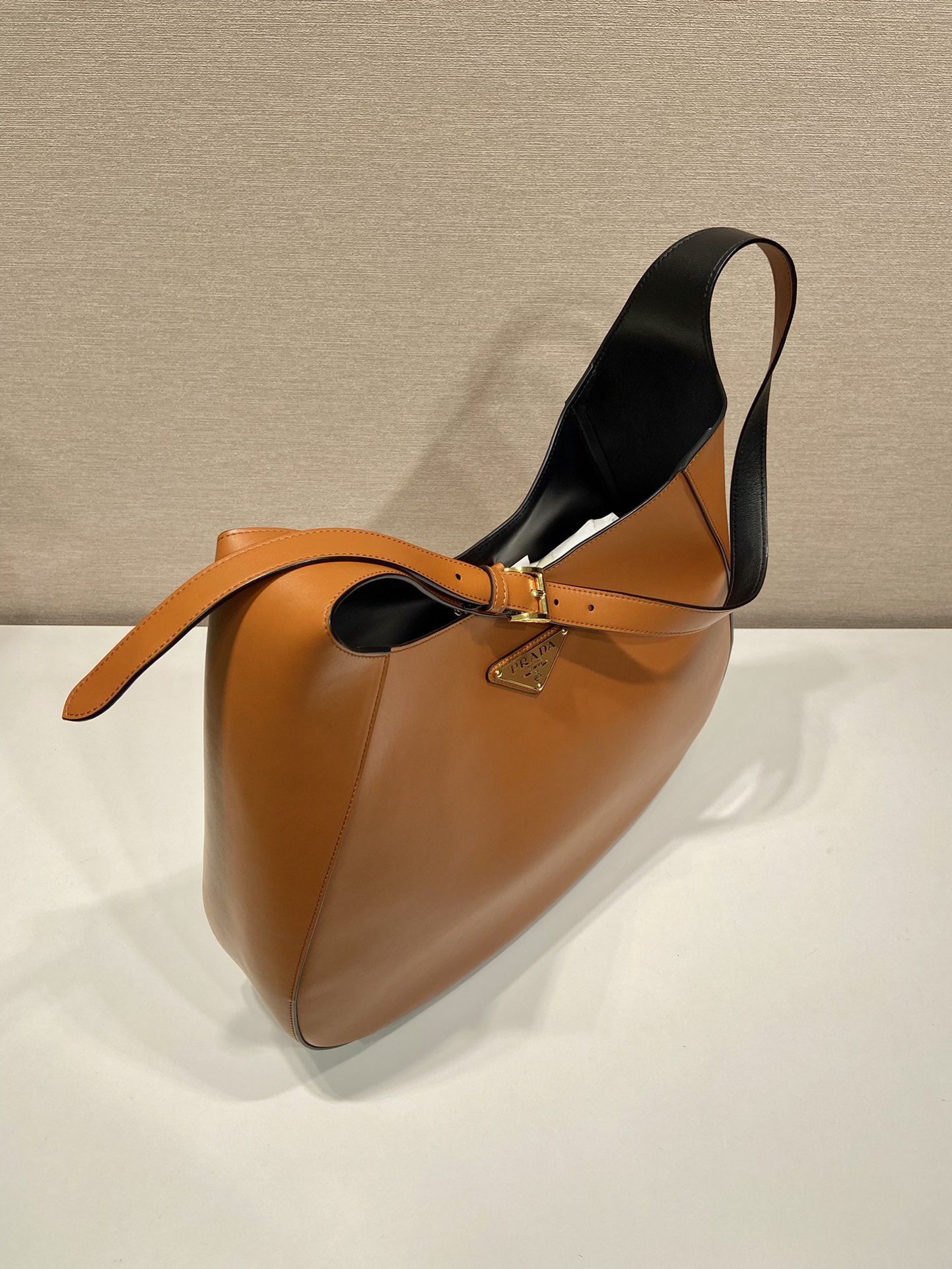 Pra*a large leather shoulder bag with topstitching