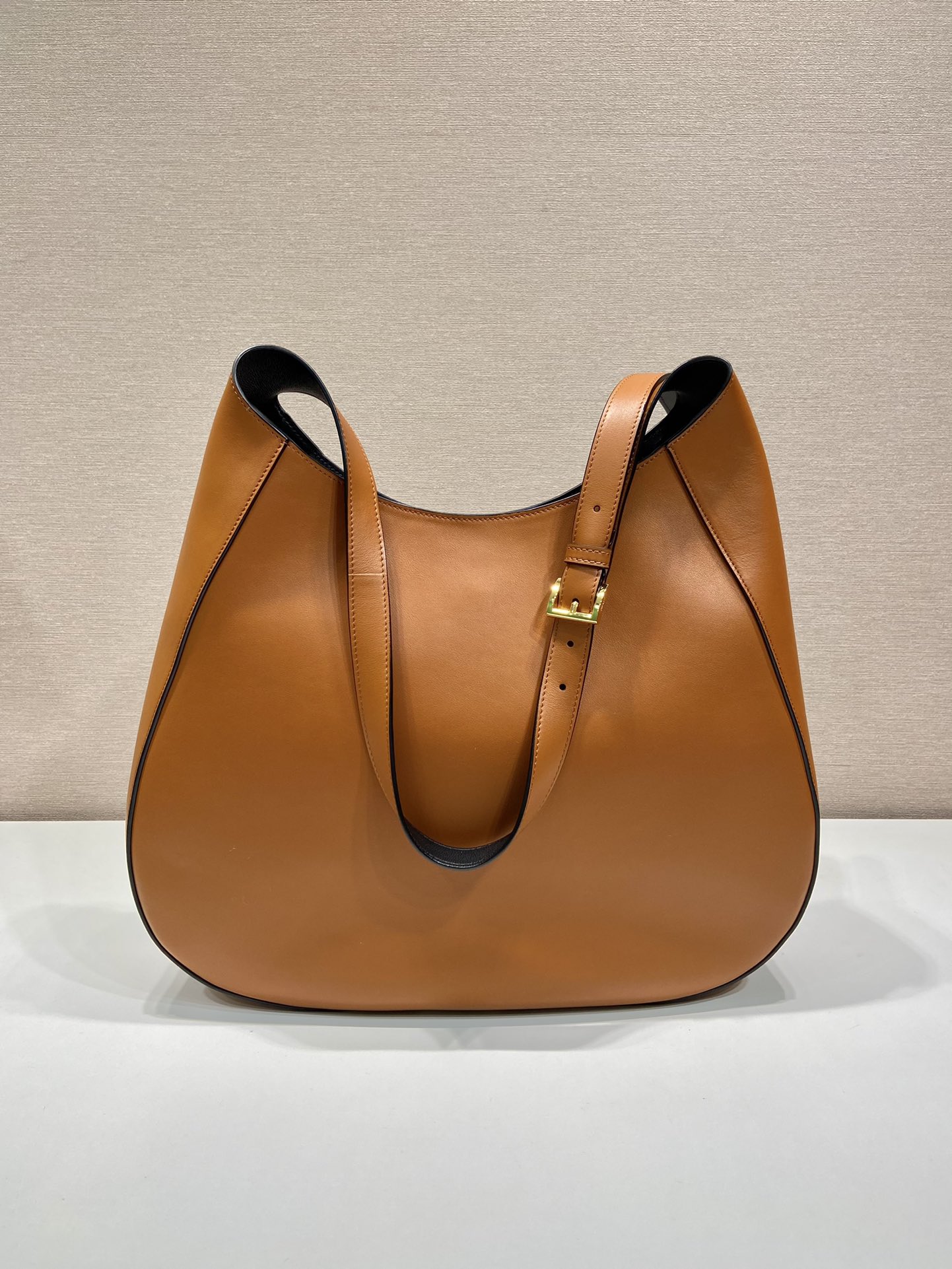 Pra*a large leather shoulder bag with topstitching