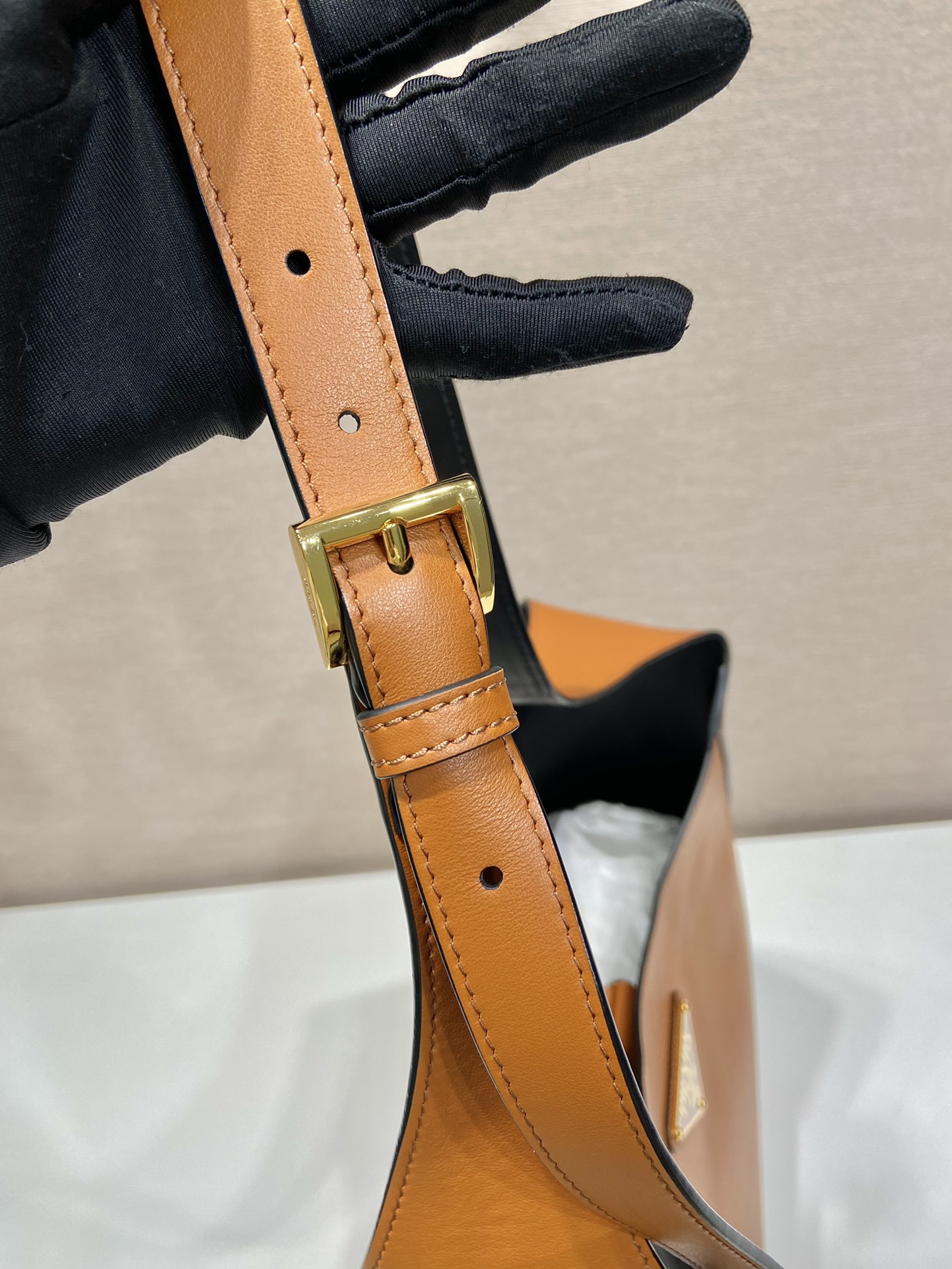 Pra*a large leather shoulder bag with topstitching