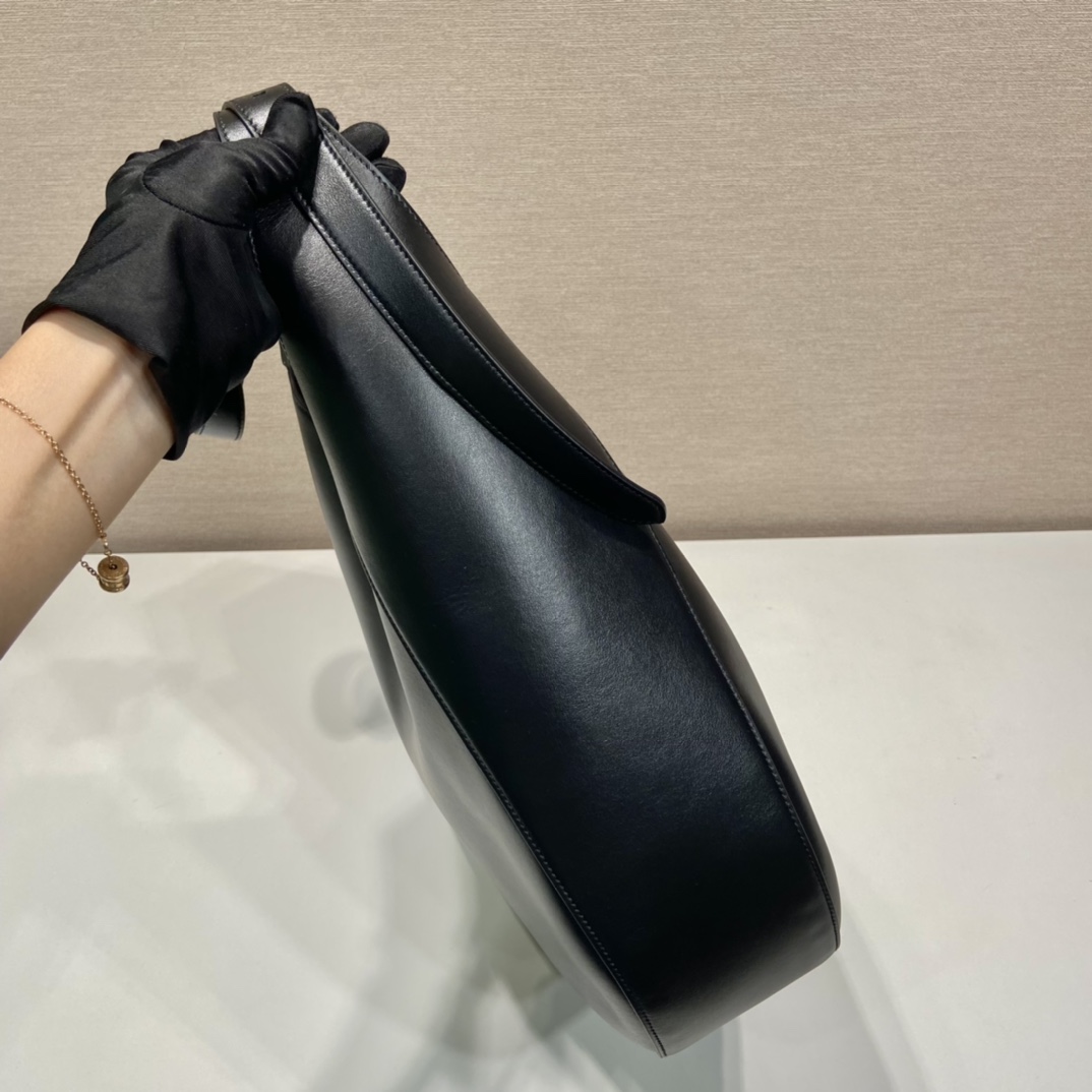 Pra*a large leather shoulder bag with topstitching