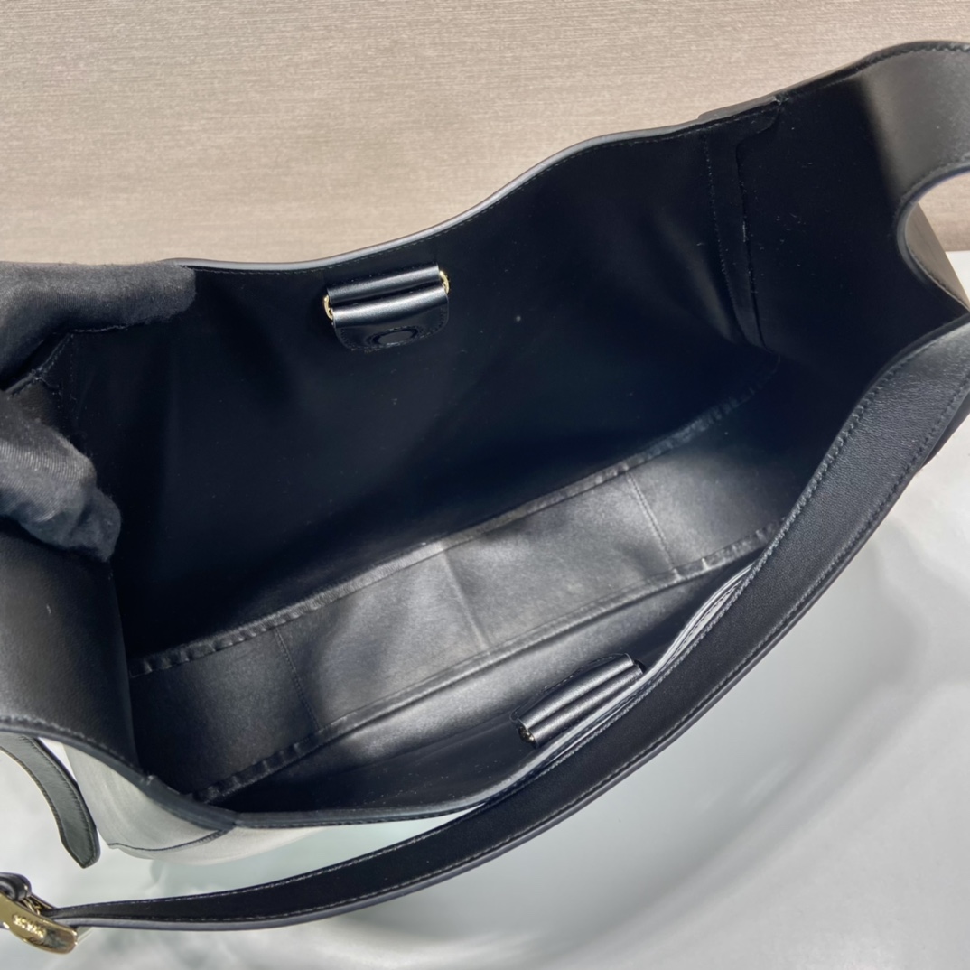 Pra*a large leather shoulder bag with topstitching