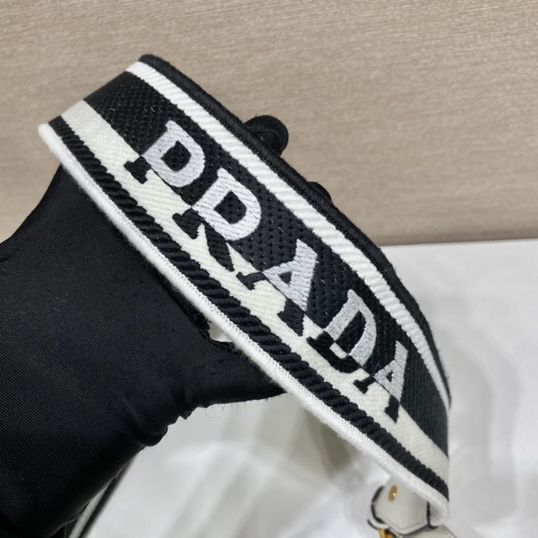 Pra*a monochrome saffiano and leather bag