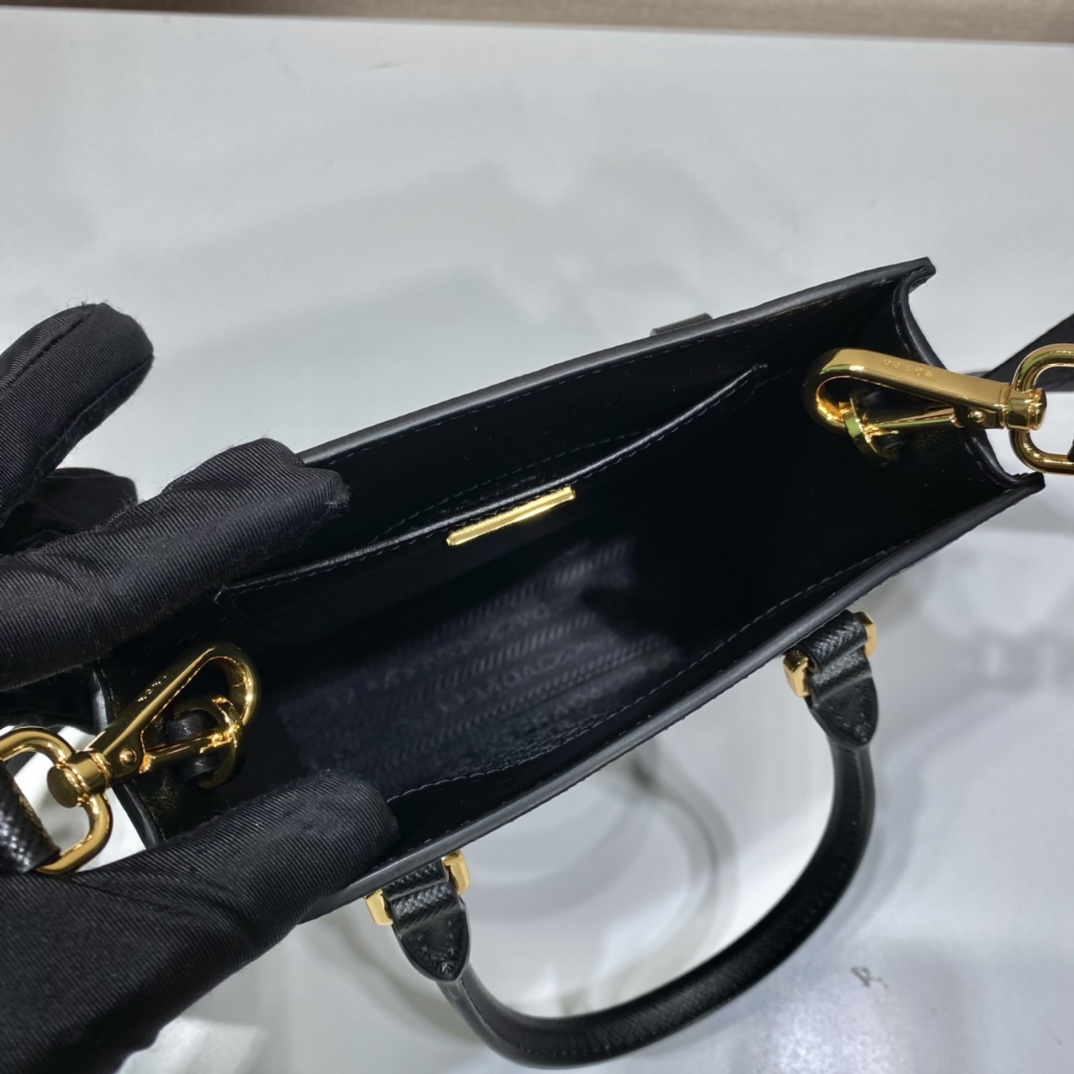 Pra*a small saffiano leather handbag