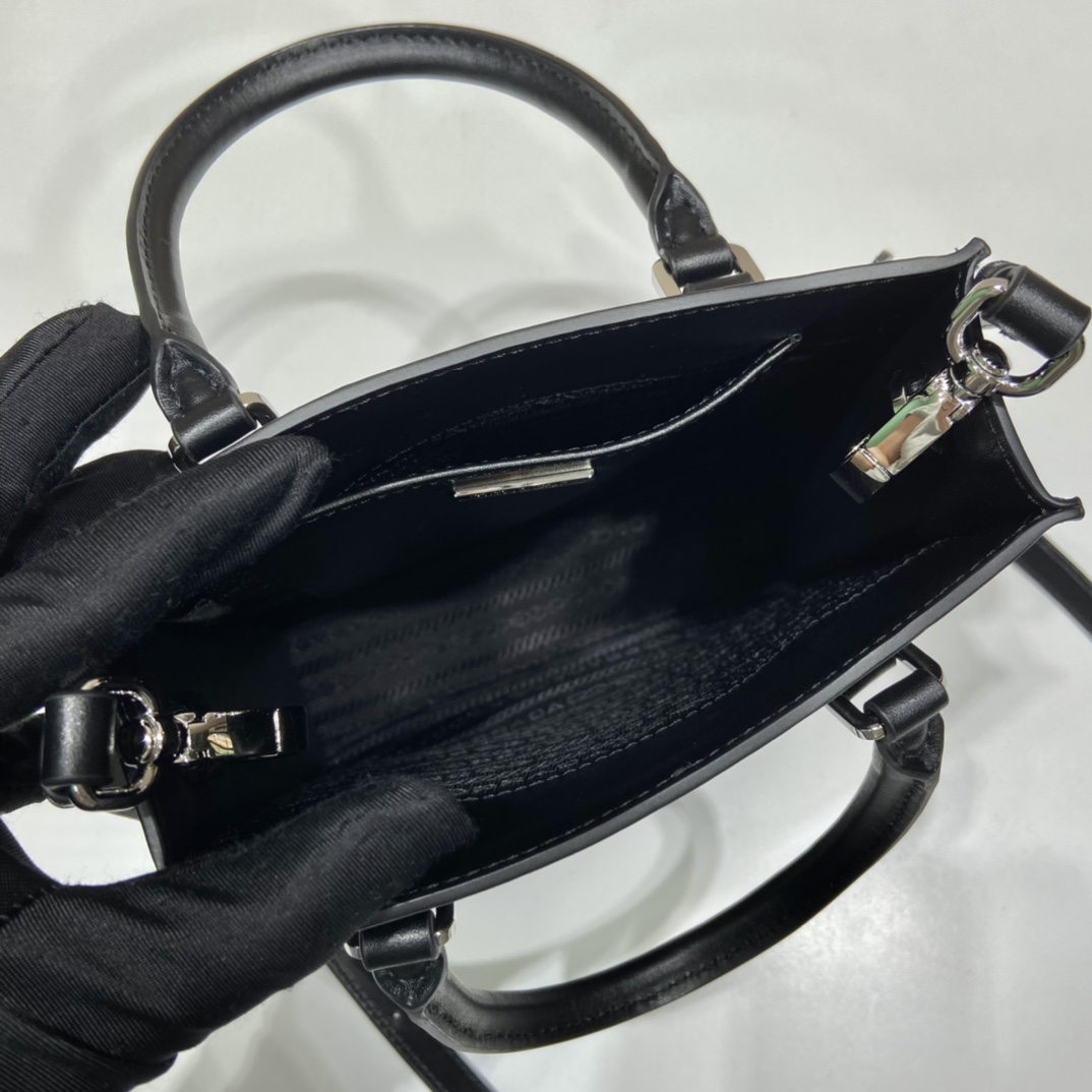 Pra*a small saffiano leather handbag