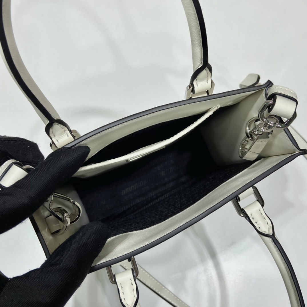 Pra*a small saffiano leather handbag