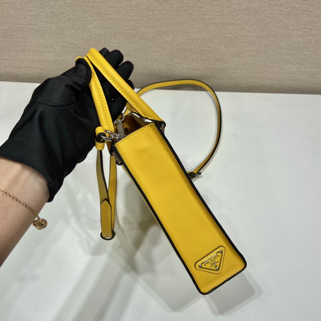 Pra*a small saffiano leather handbag