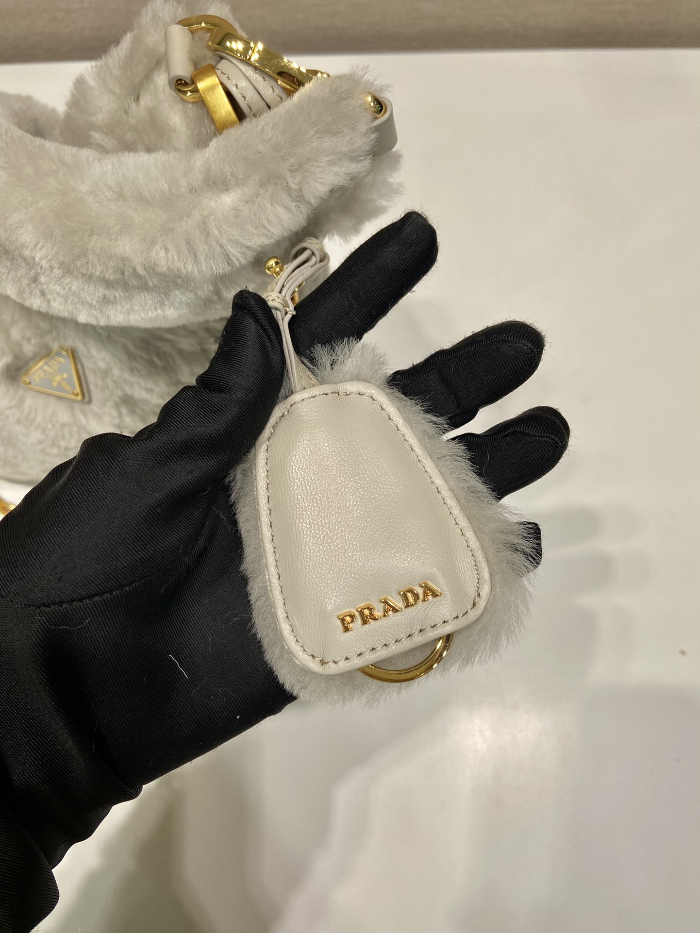 Pra*a shearling mini-bag