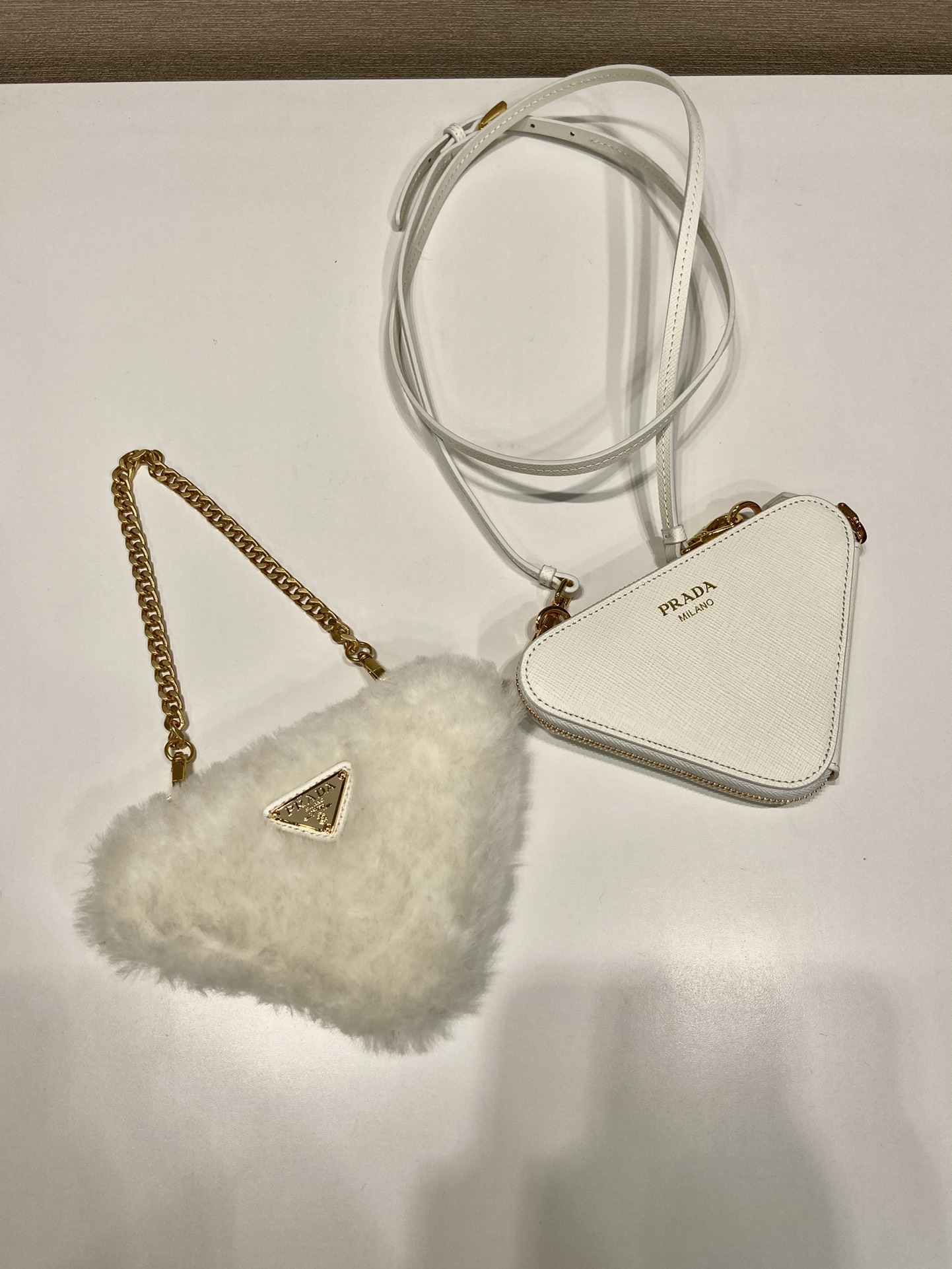 Pra*a shearling and saffiano leather mini-pouch