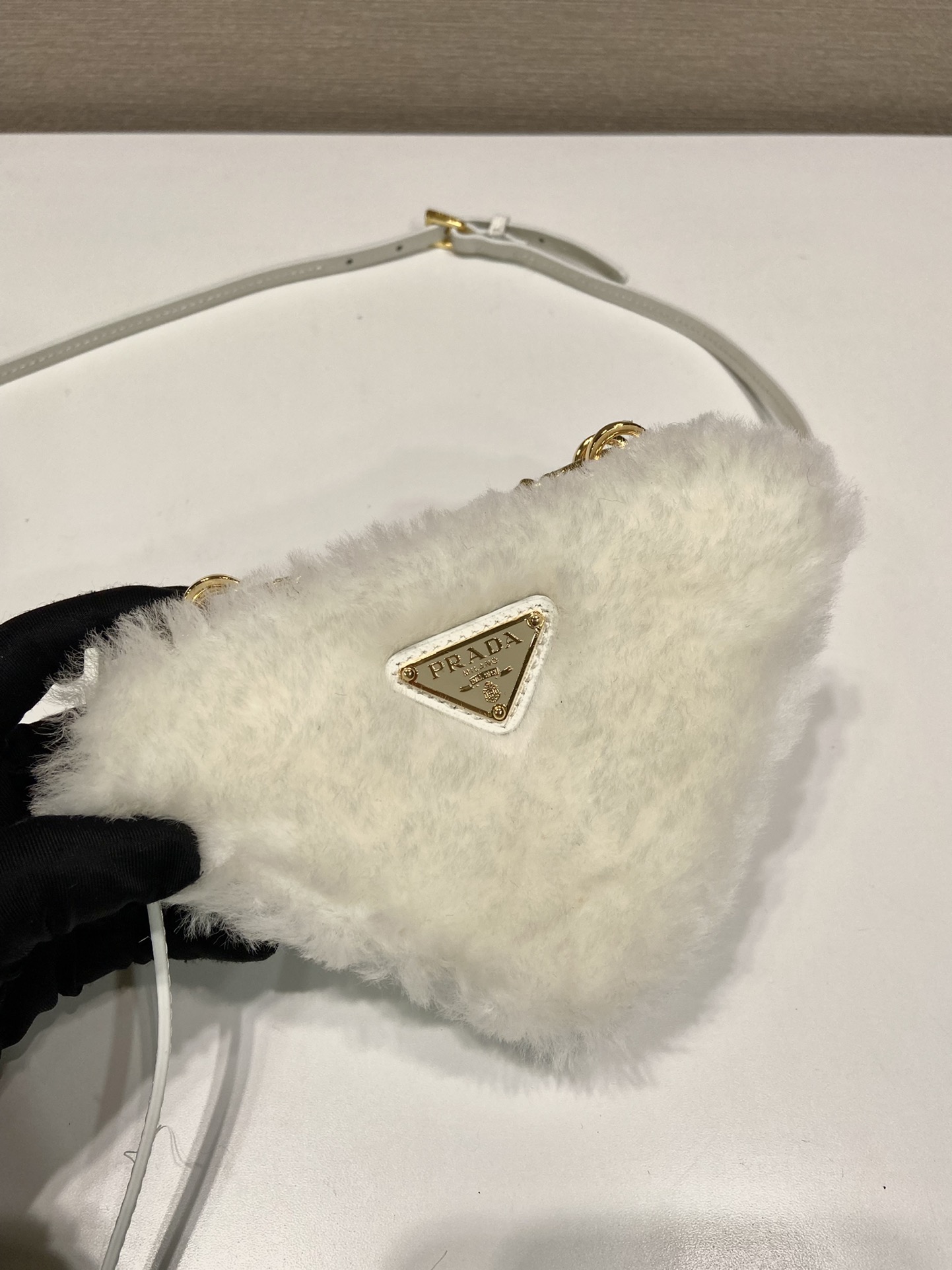 Pra*a shearling and saffiano leather mini-pouch