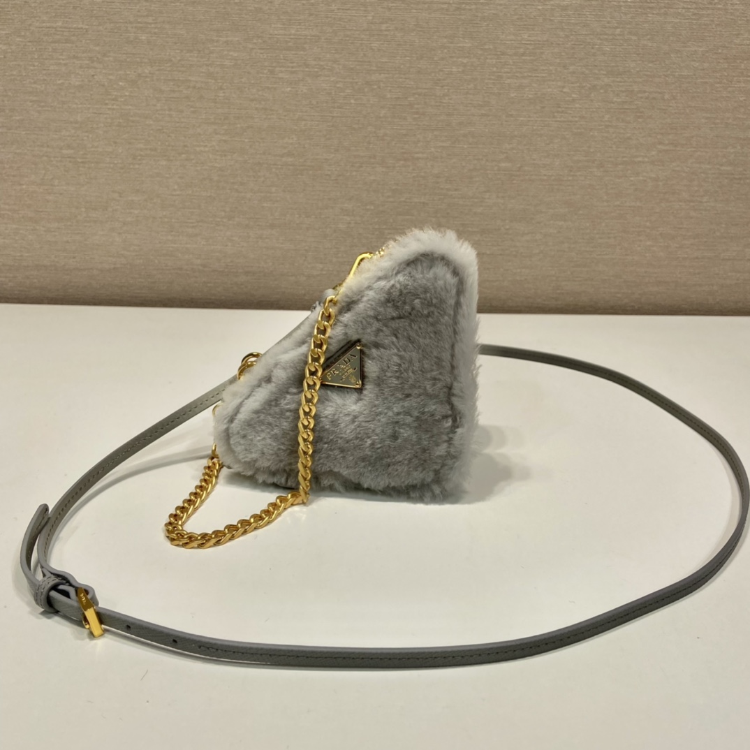 Pra*a shearling and saffiano leather mini-pouch