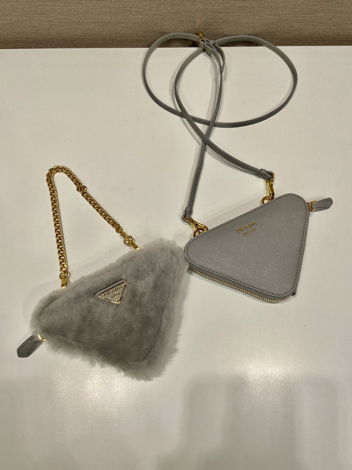 Pra*a shearling and saffiano leather mini-pouch
