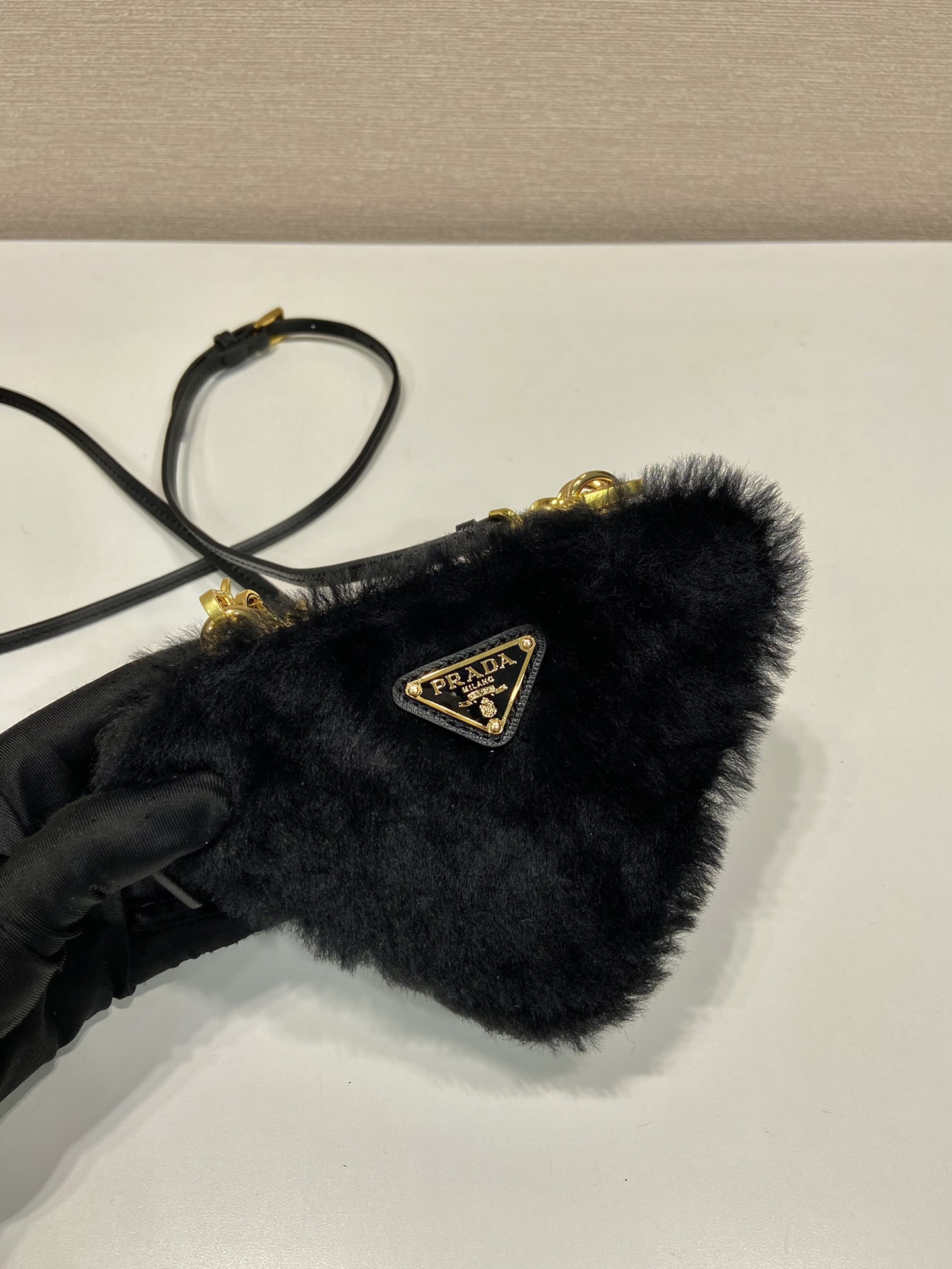 Pra*a shearling and saffiano leather mini-pouch
