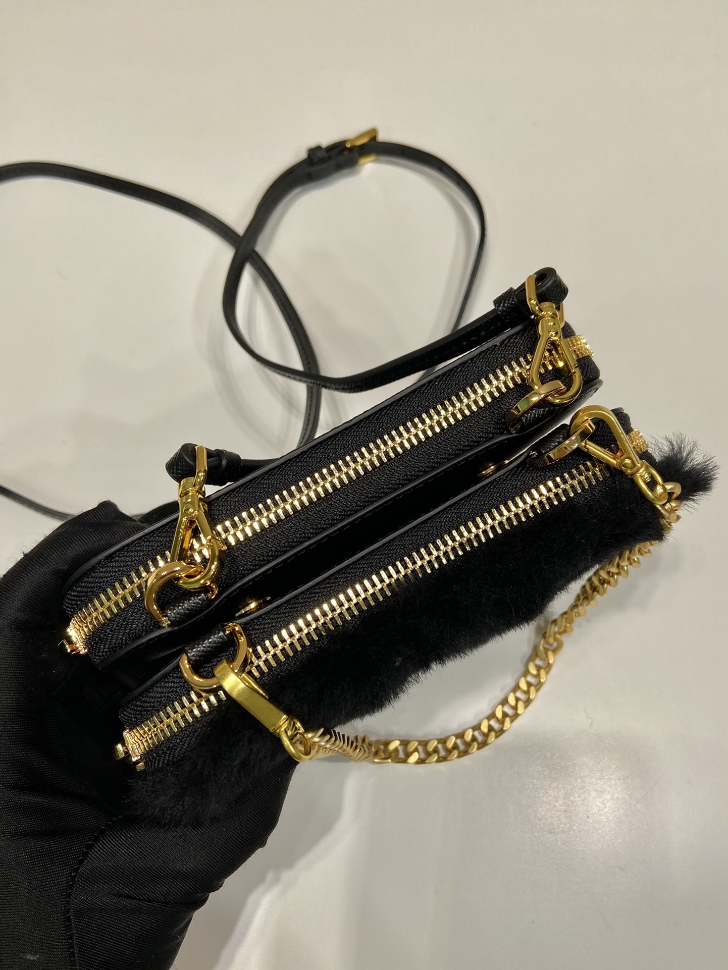 Pra*a shearling and saffiano leather mini-pouch