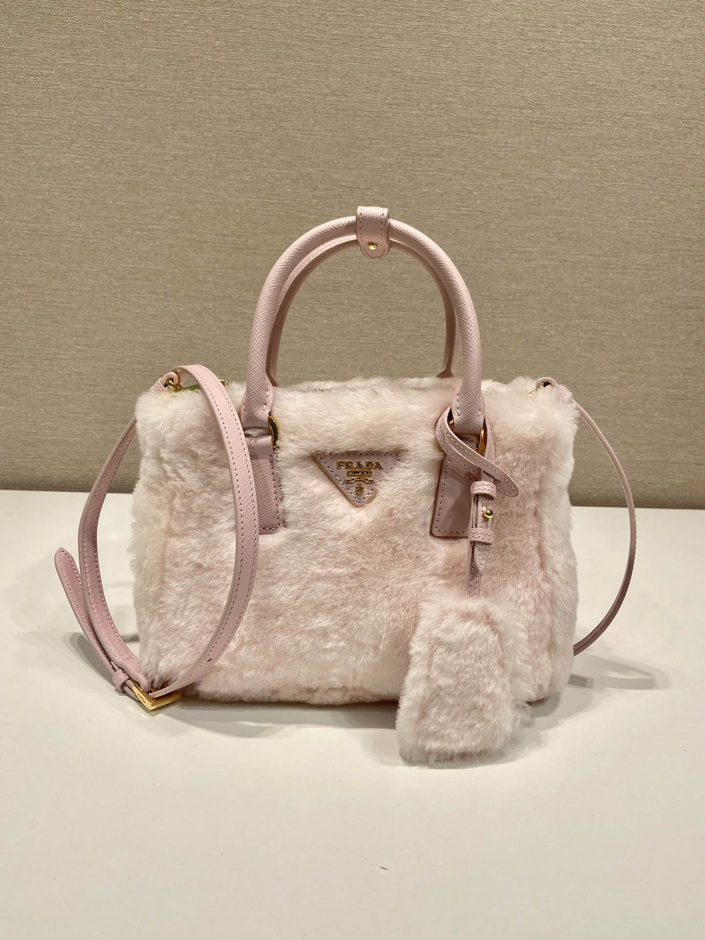 Pra*a galleria saffiano shearling top-handle bag