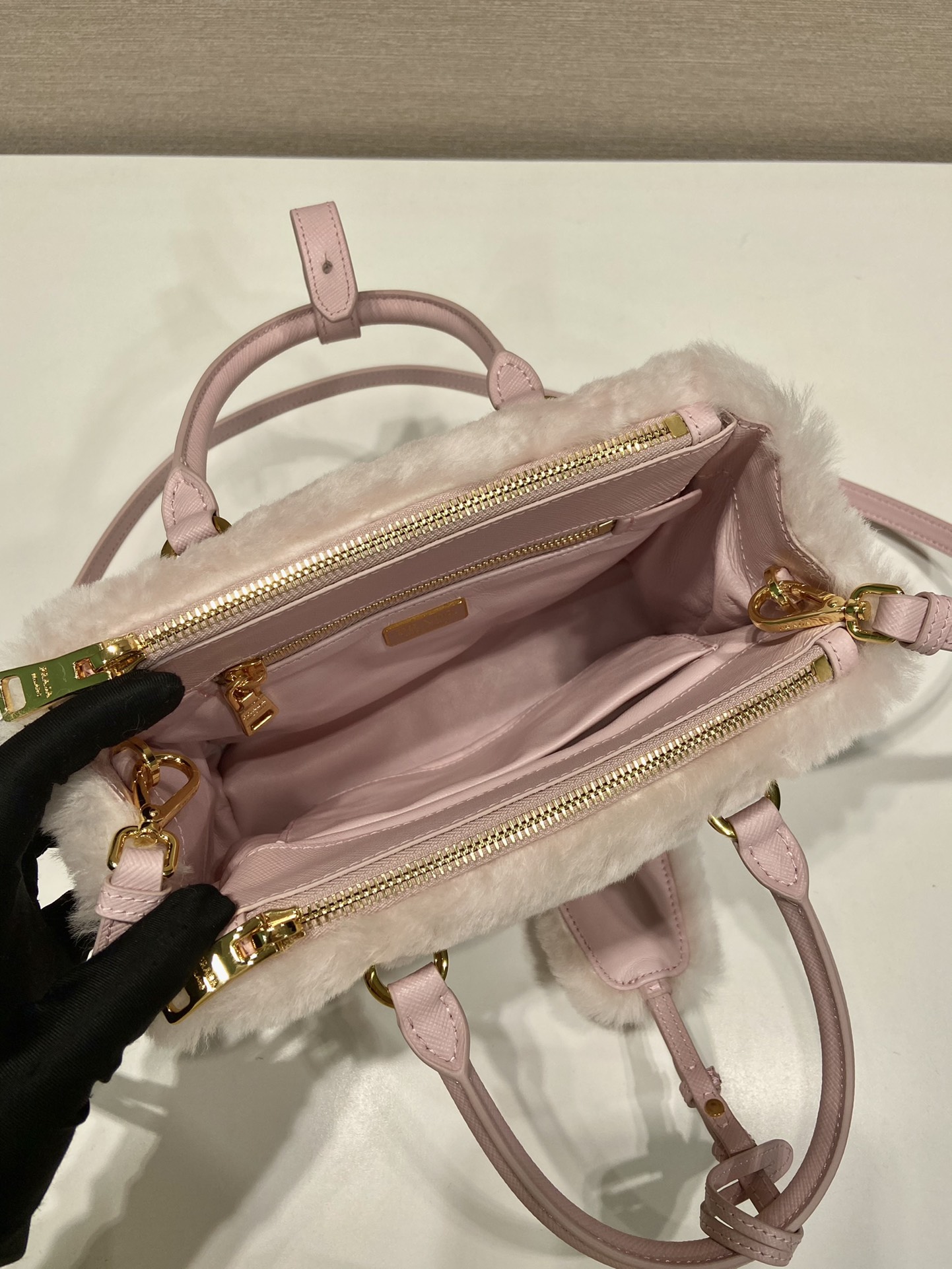 Pra*a galleria saffiano shearling top-handle bag
