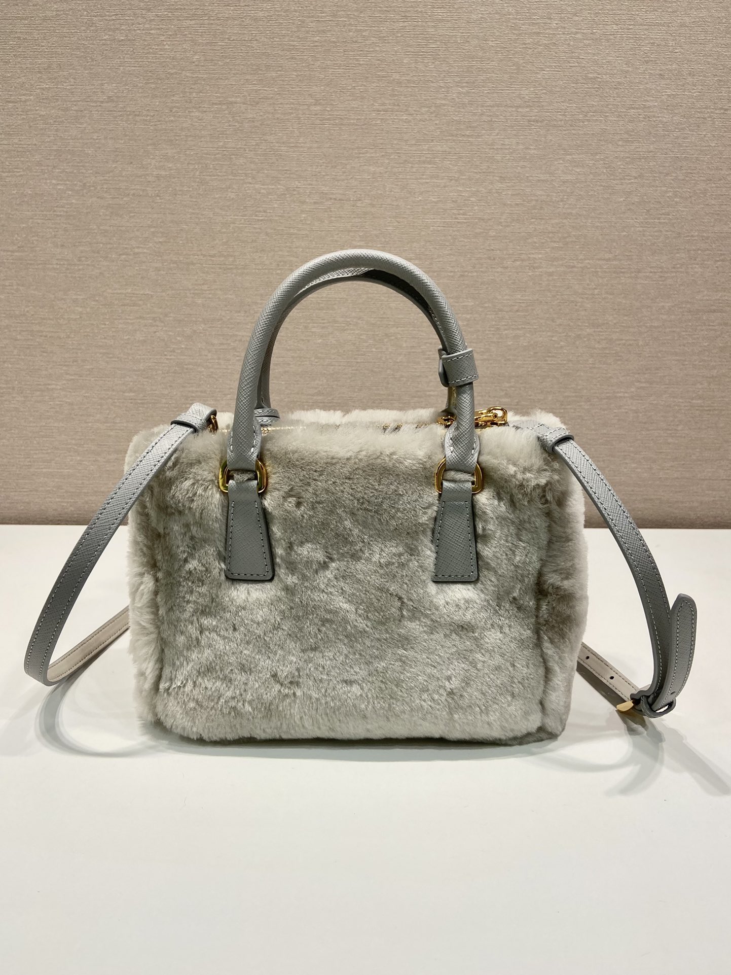 Pra*a galleria saffiano shearling top-handle bag