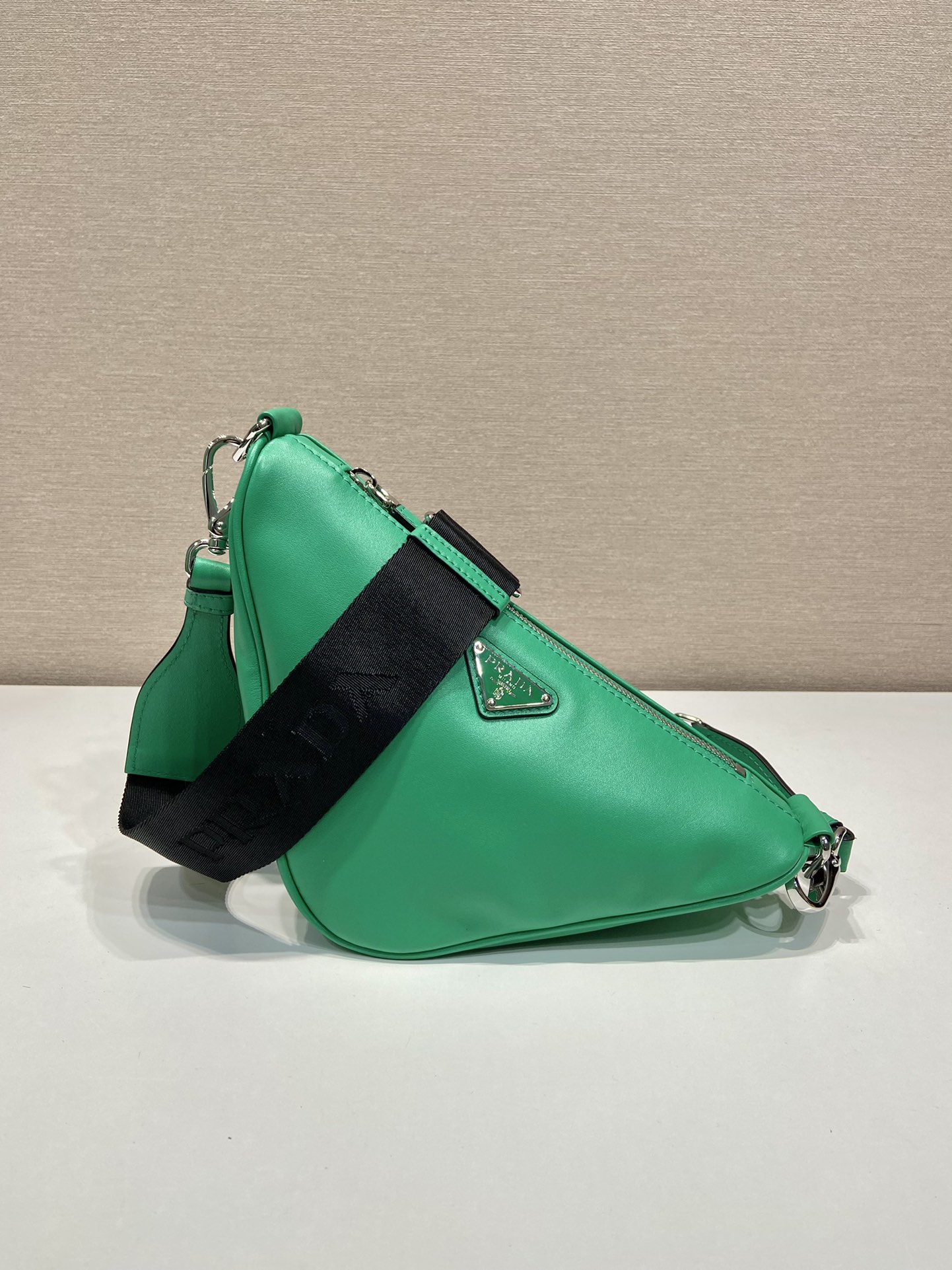 saffiano Pra*a triangle bag