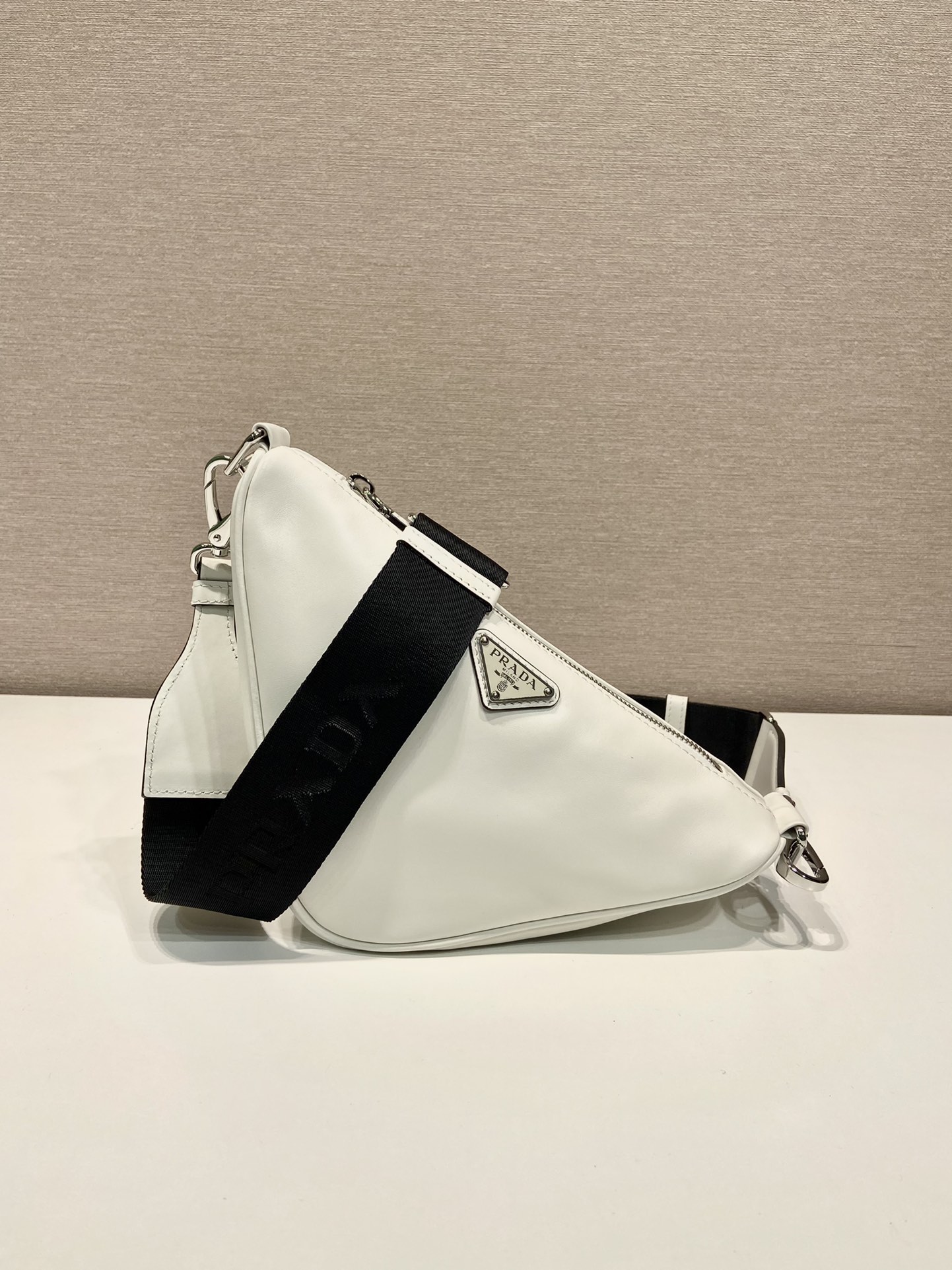 saffiano Pra*a triangle bag