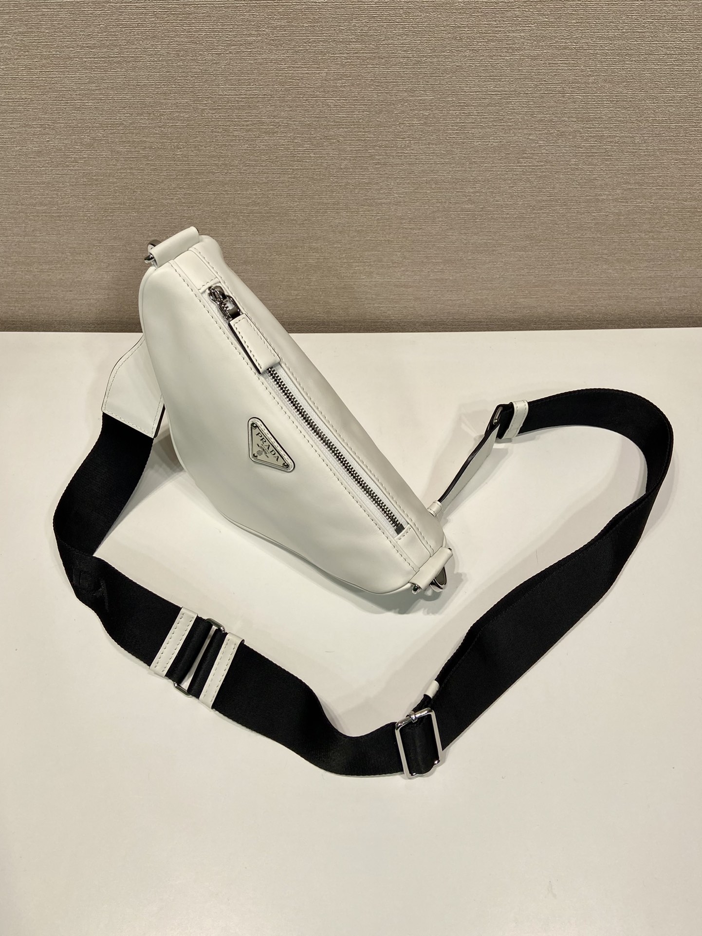 saffiano Pra*a triangle bag