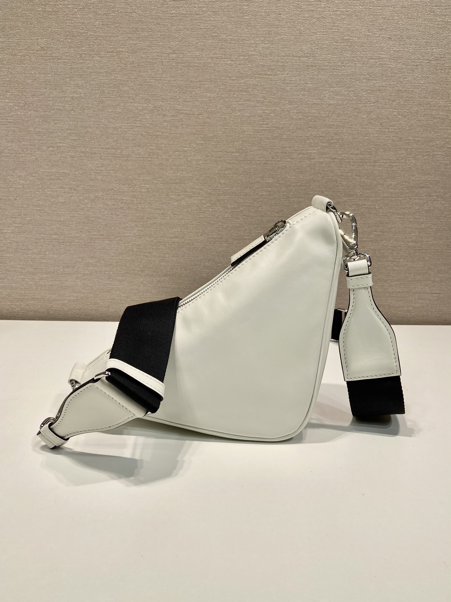 saffiano Pra*a triangle bag