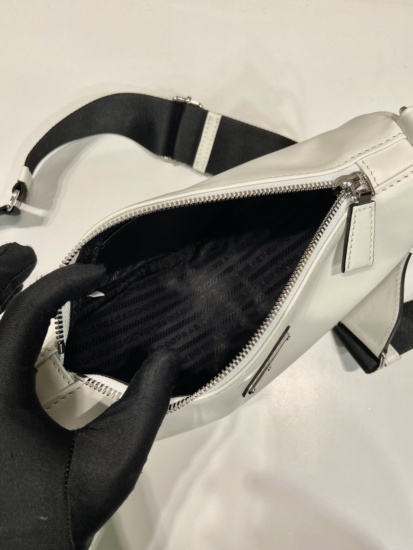 saffiano Pra*a triangle bag