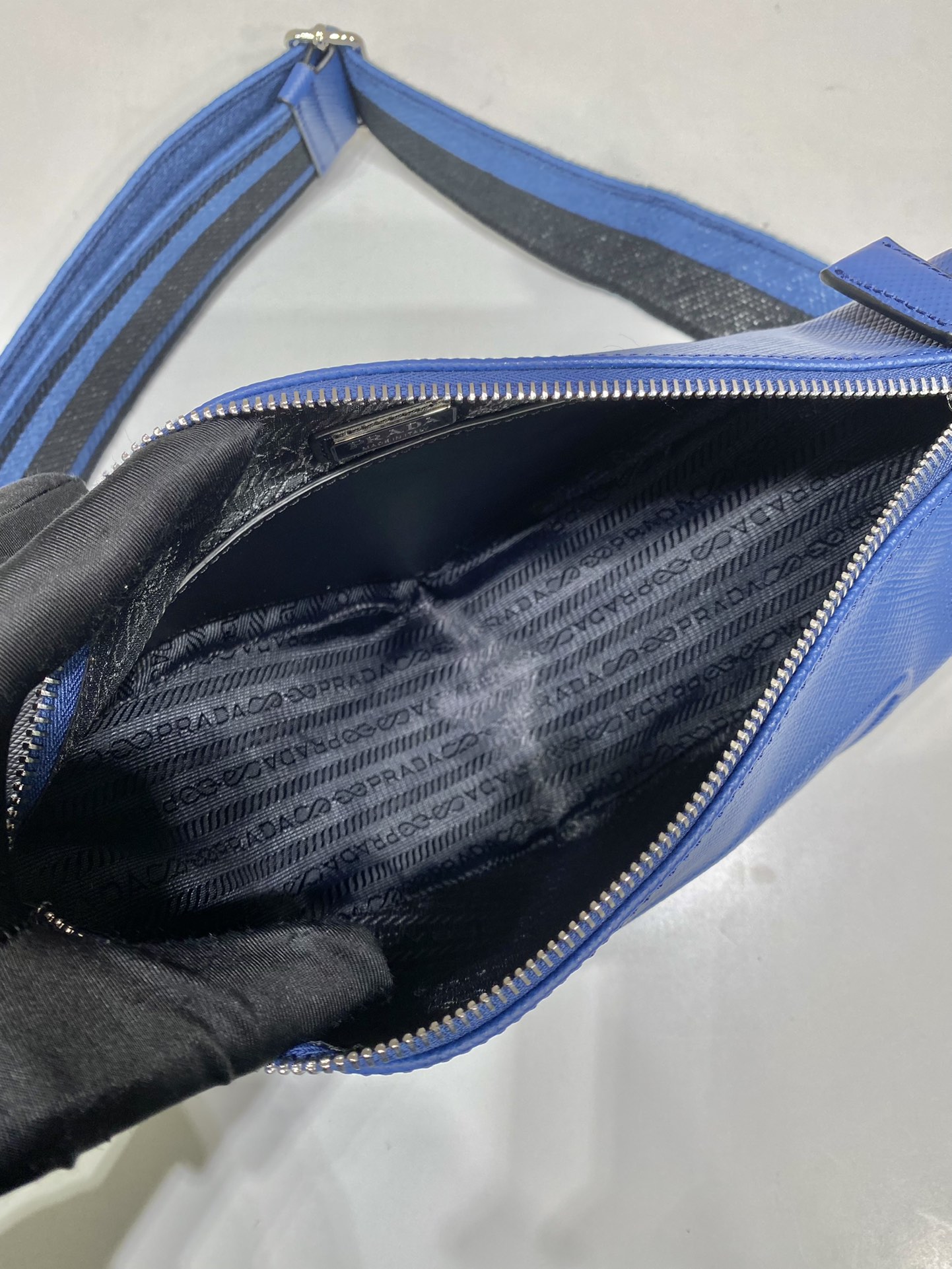 saffiano Pra*a triangle bag
