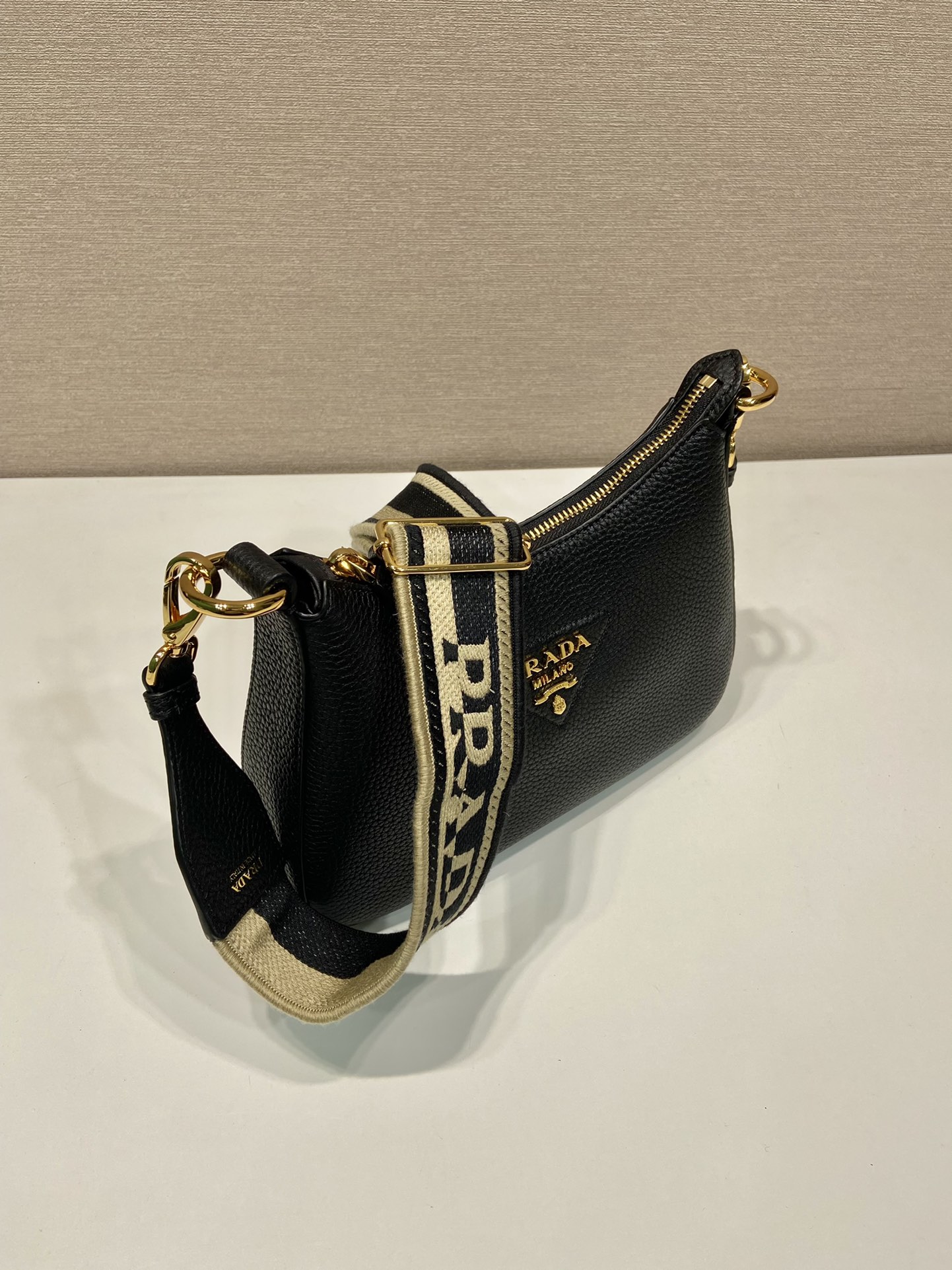 Pra*a leather shoulder bag