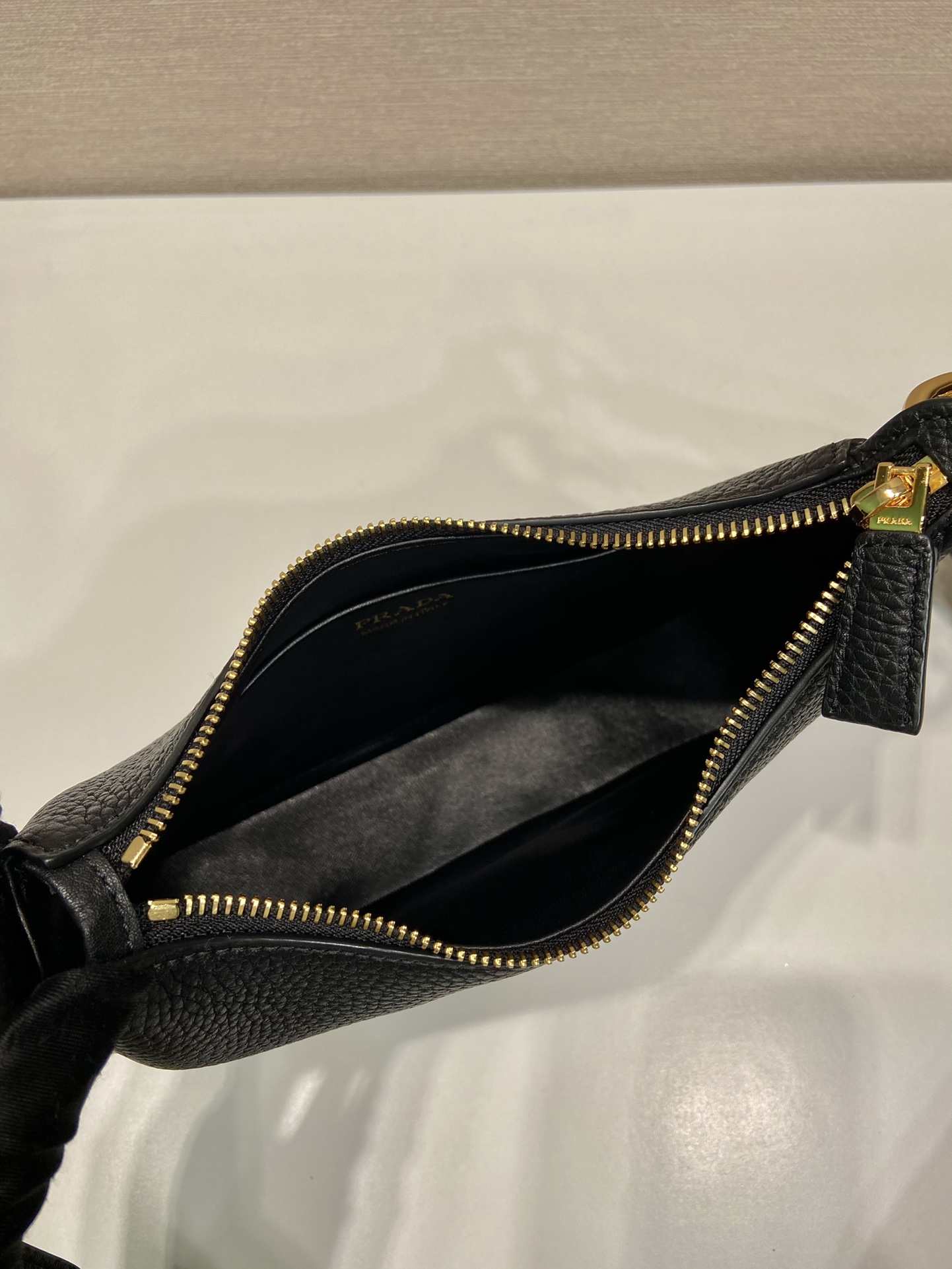Pra*a leather shoulder bag
