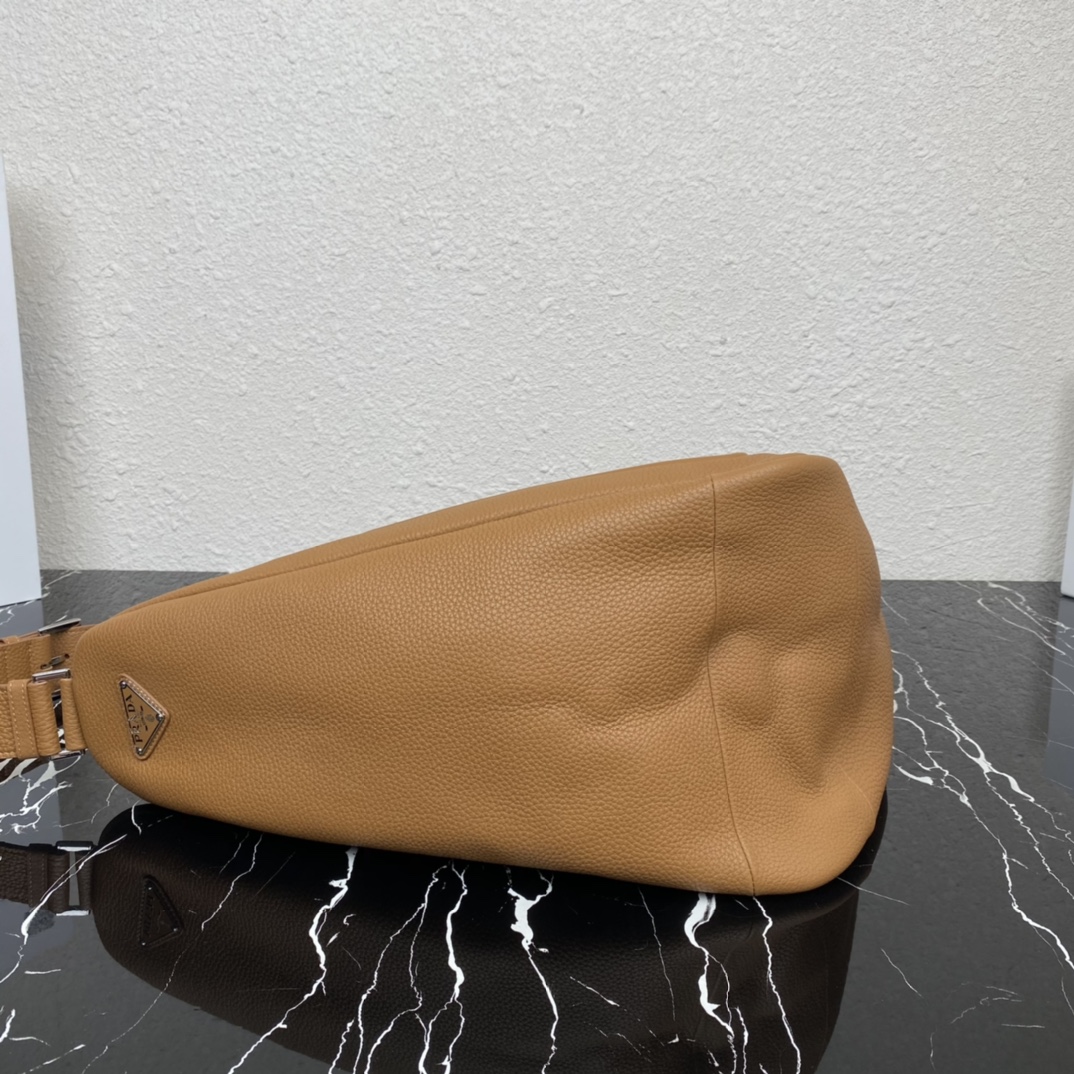 large leather Pra*a triangle bag