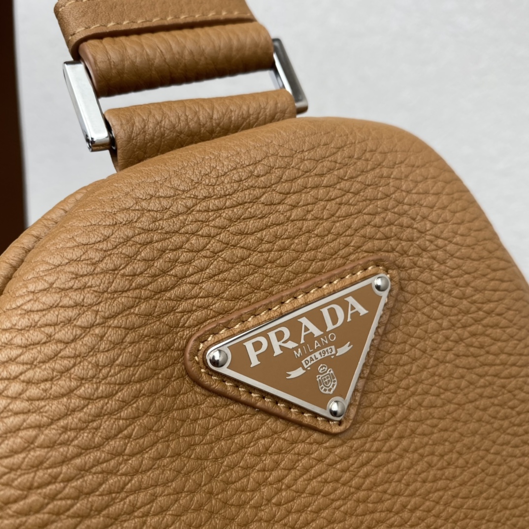 large leather Pra*a triangle bag