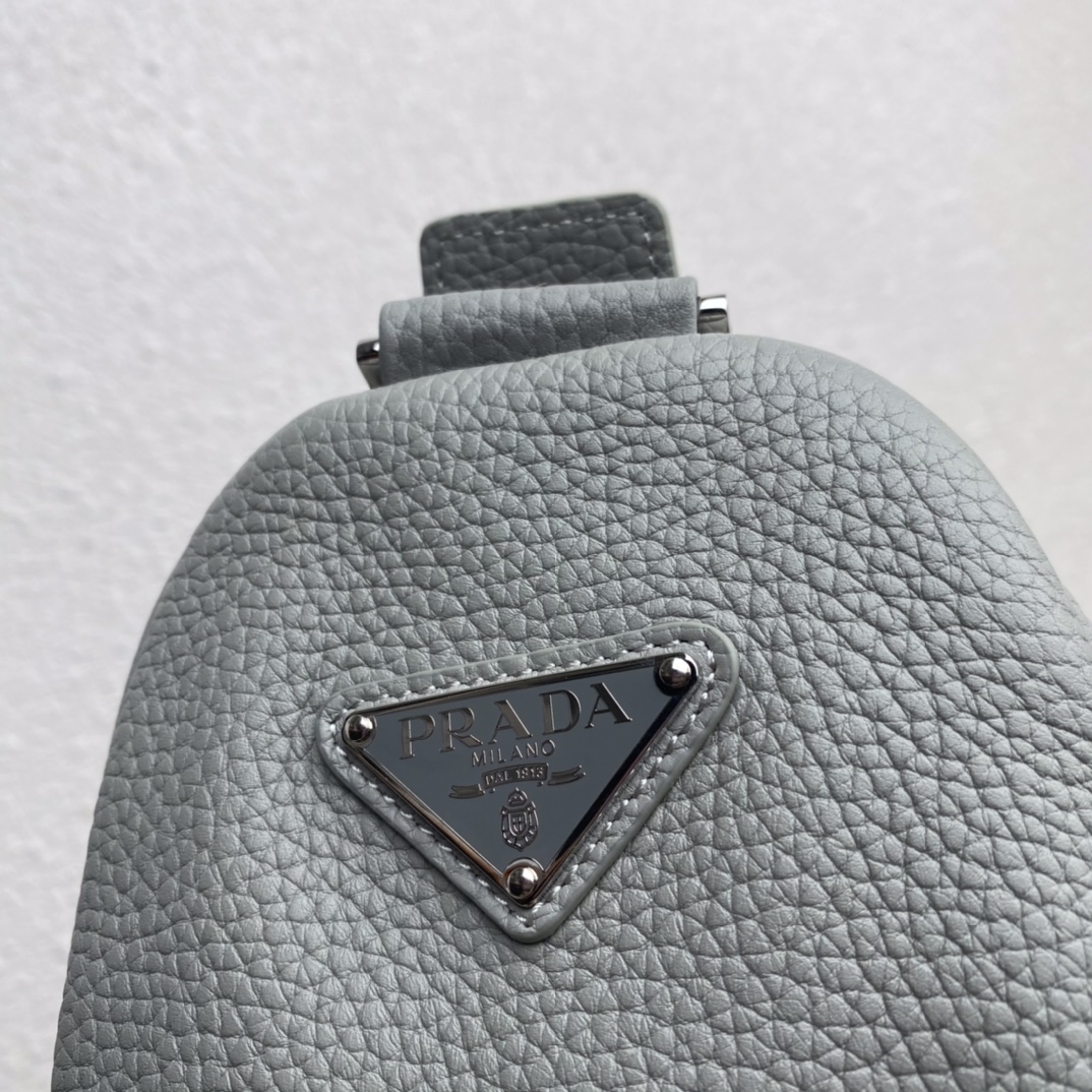 large leather Pra*a triangle bag