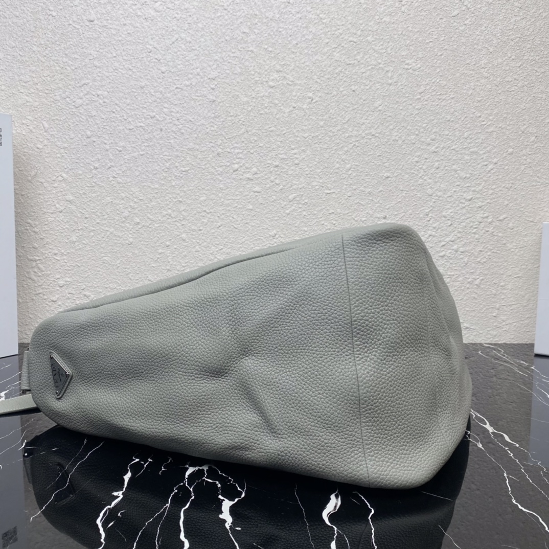 large leather Pra*a triangle bag