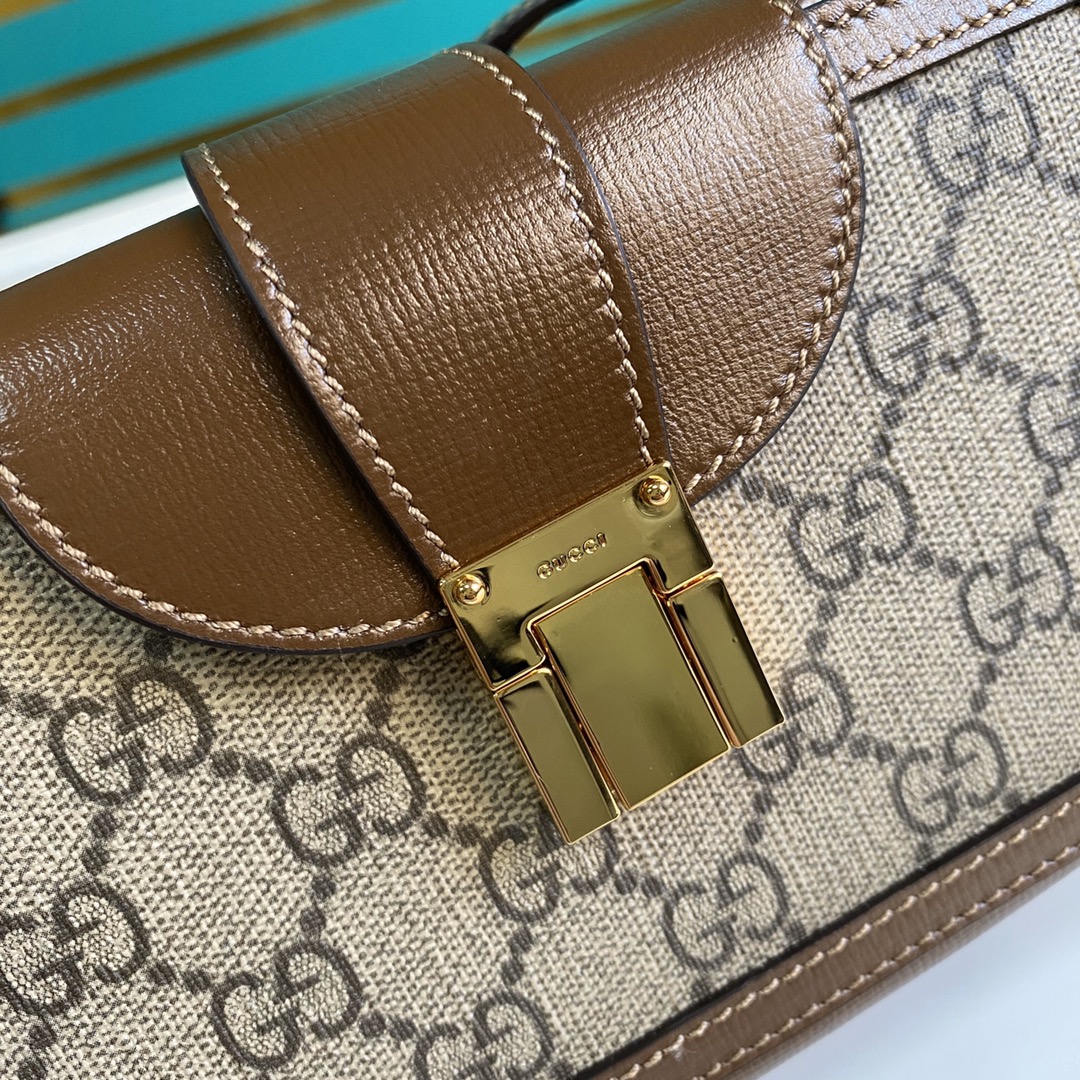 G*u*i gg mini bag with clasp closure