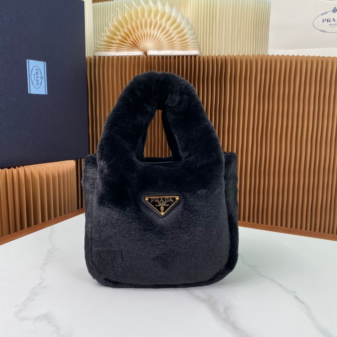 Pra*a shearling mini handbag