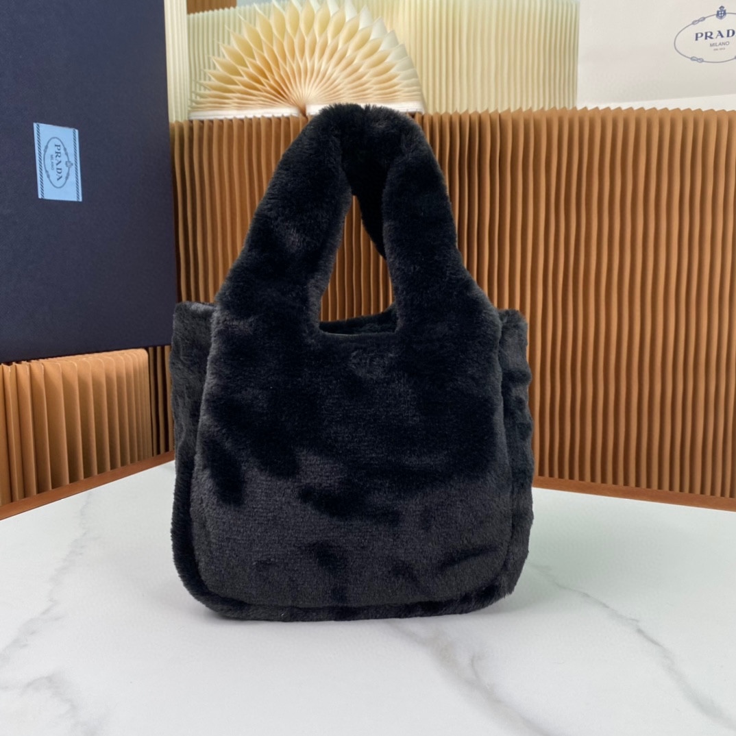 Pra*a shearling mini handbag