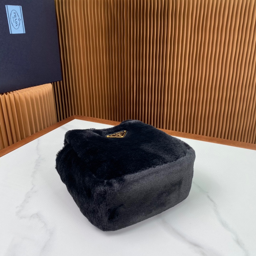 Pra*a shearling mini handbag