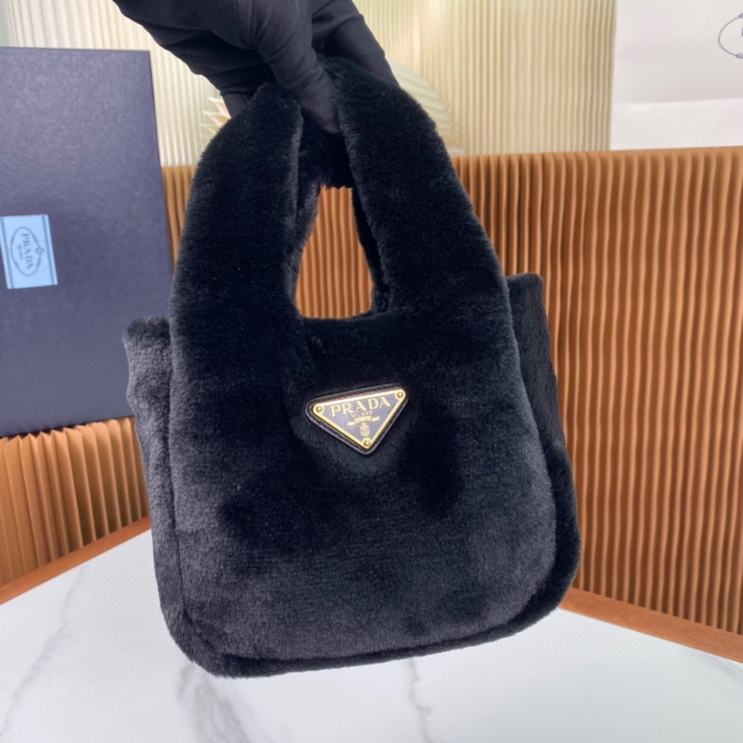 Pra*a shearling mini handbag