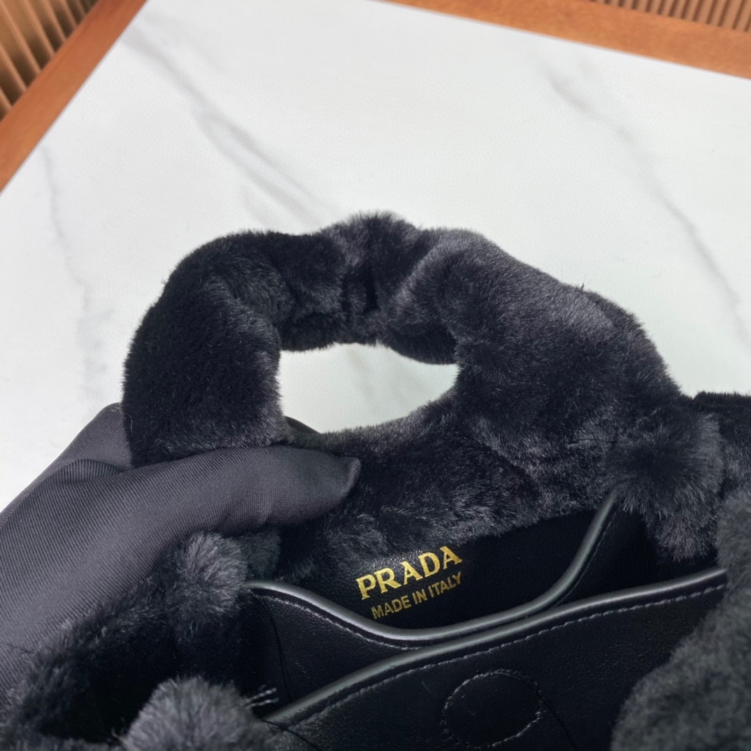 Pra*a shearling mini handbag