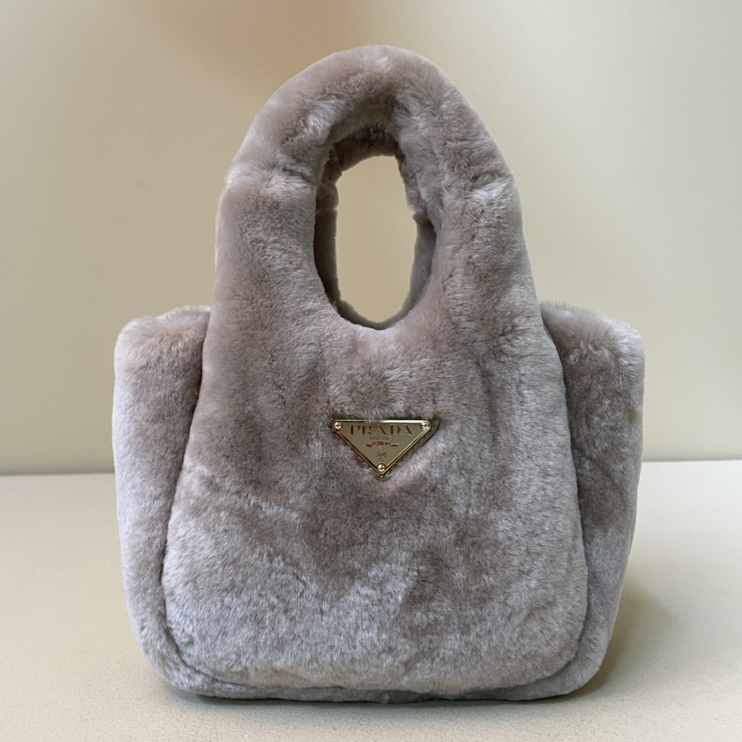 Pra*a shearling mini handbag
