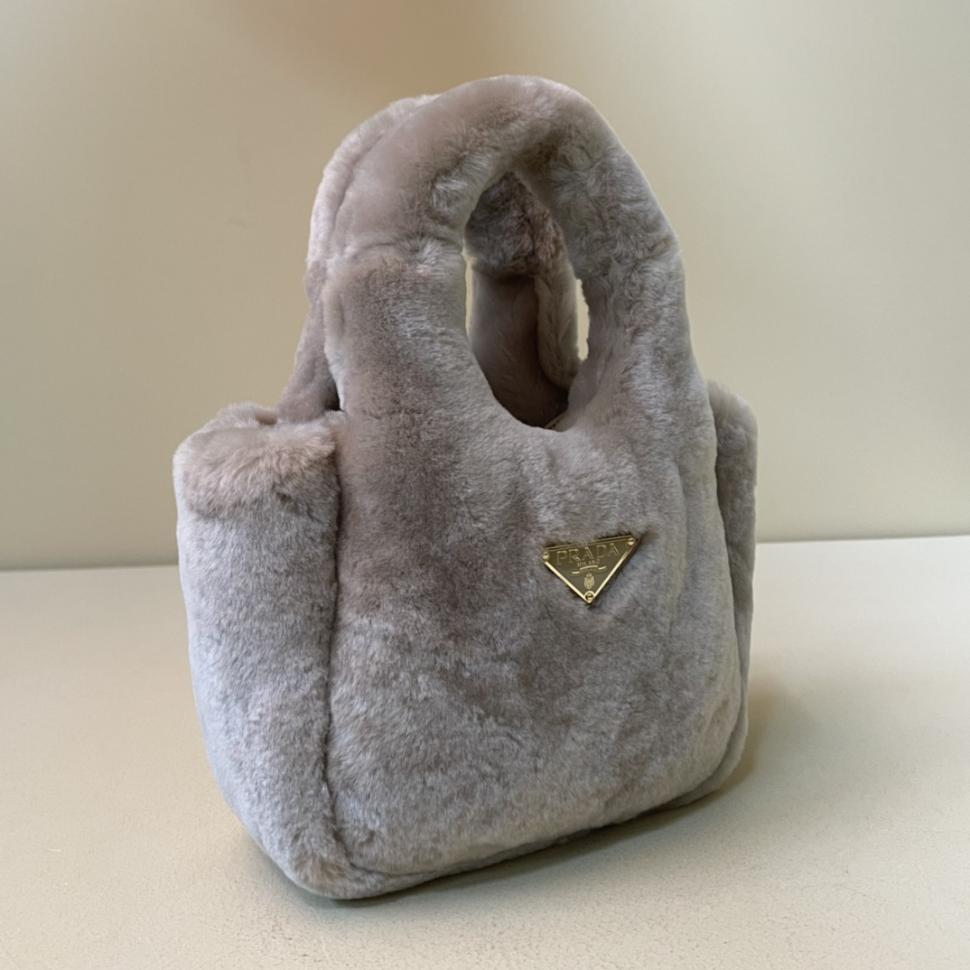 Pra*a shearling mini handbag