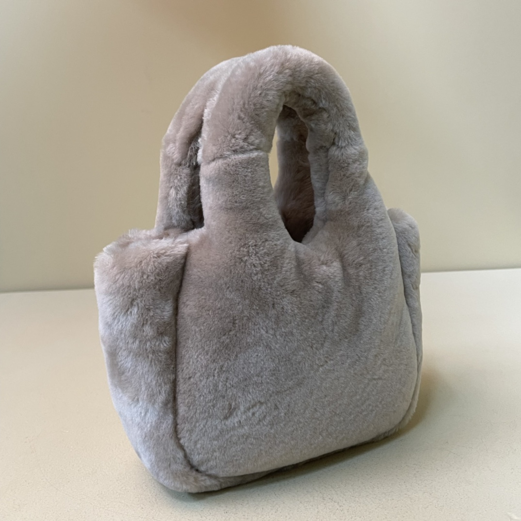 Pra*a shearling mini handbag