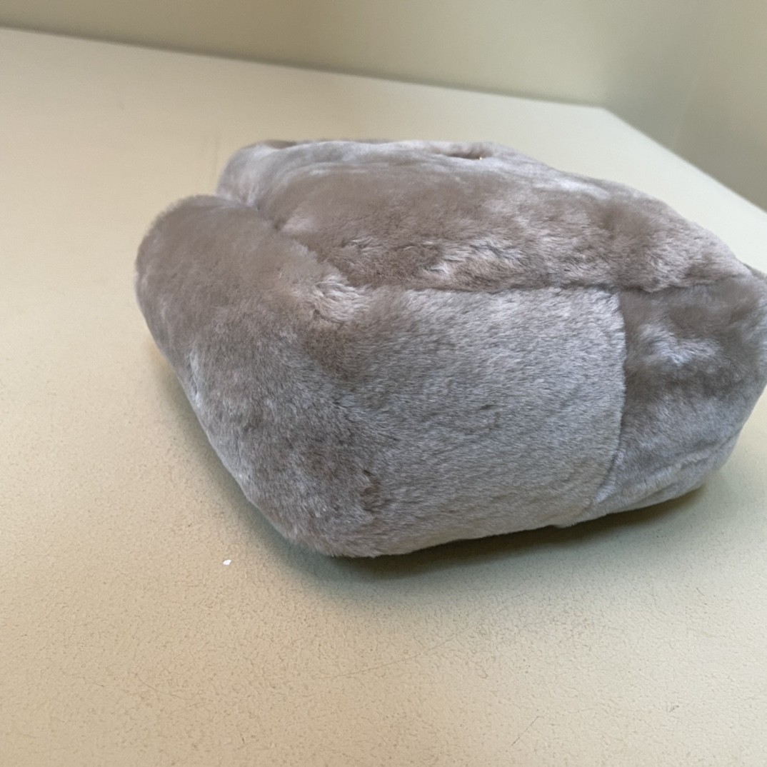 Pra*a shearling mini handbag