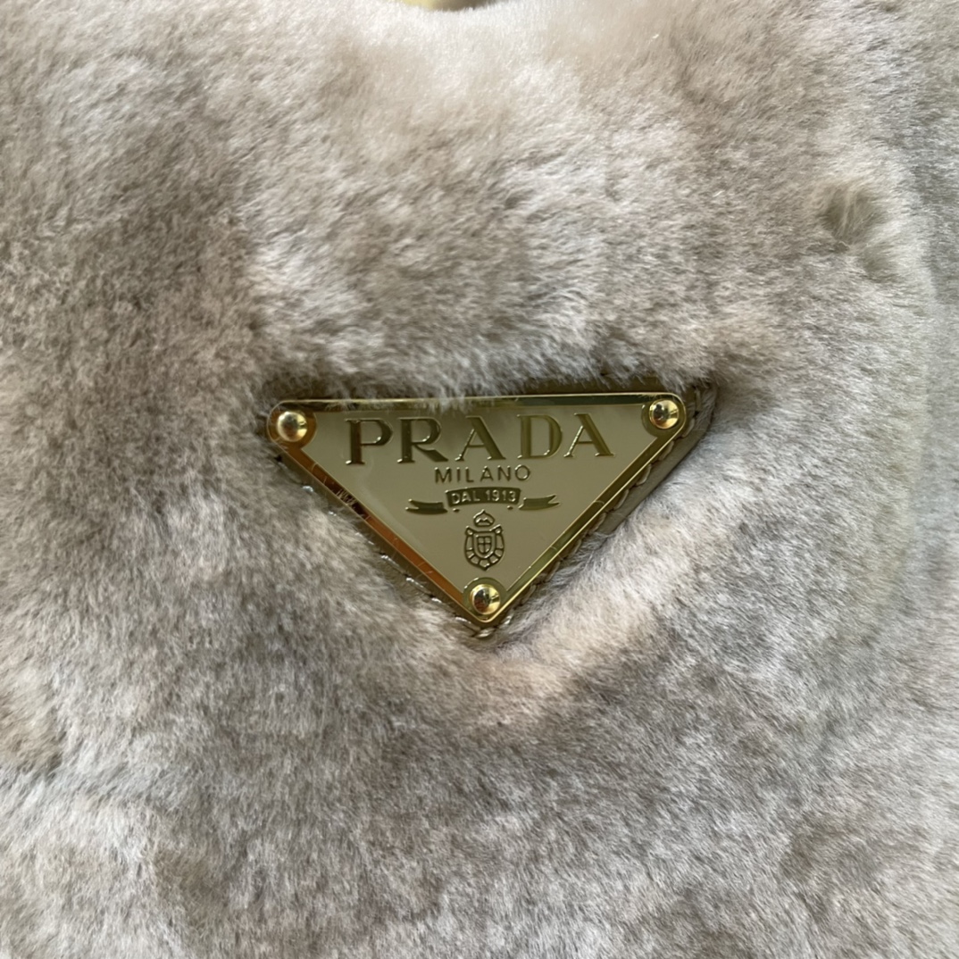 Pra*a shearling mini handbag