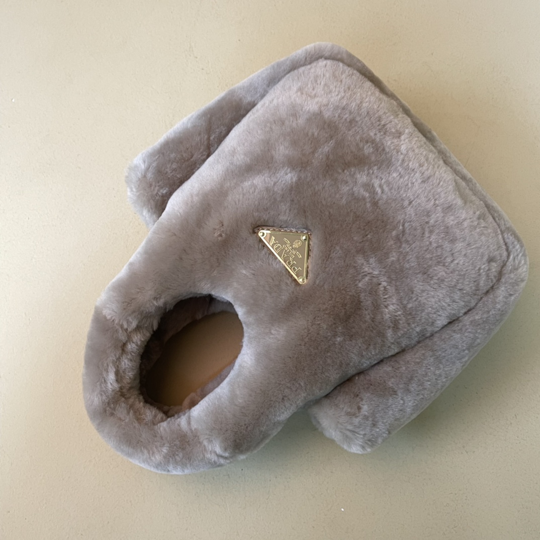 Pra*a shearling mini handbag