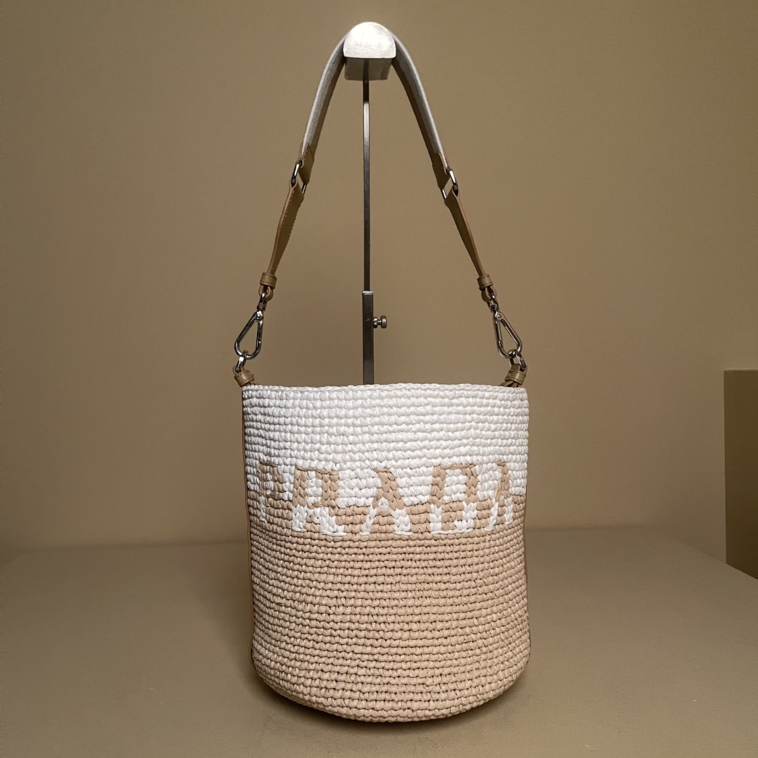 Pra*a crochet and leather mini-bucket bag