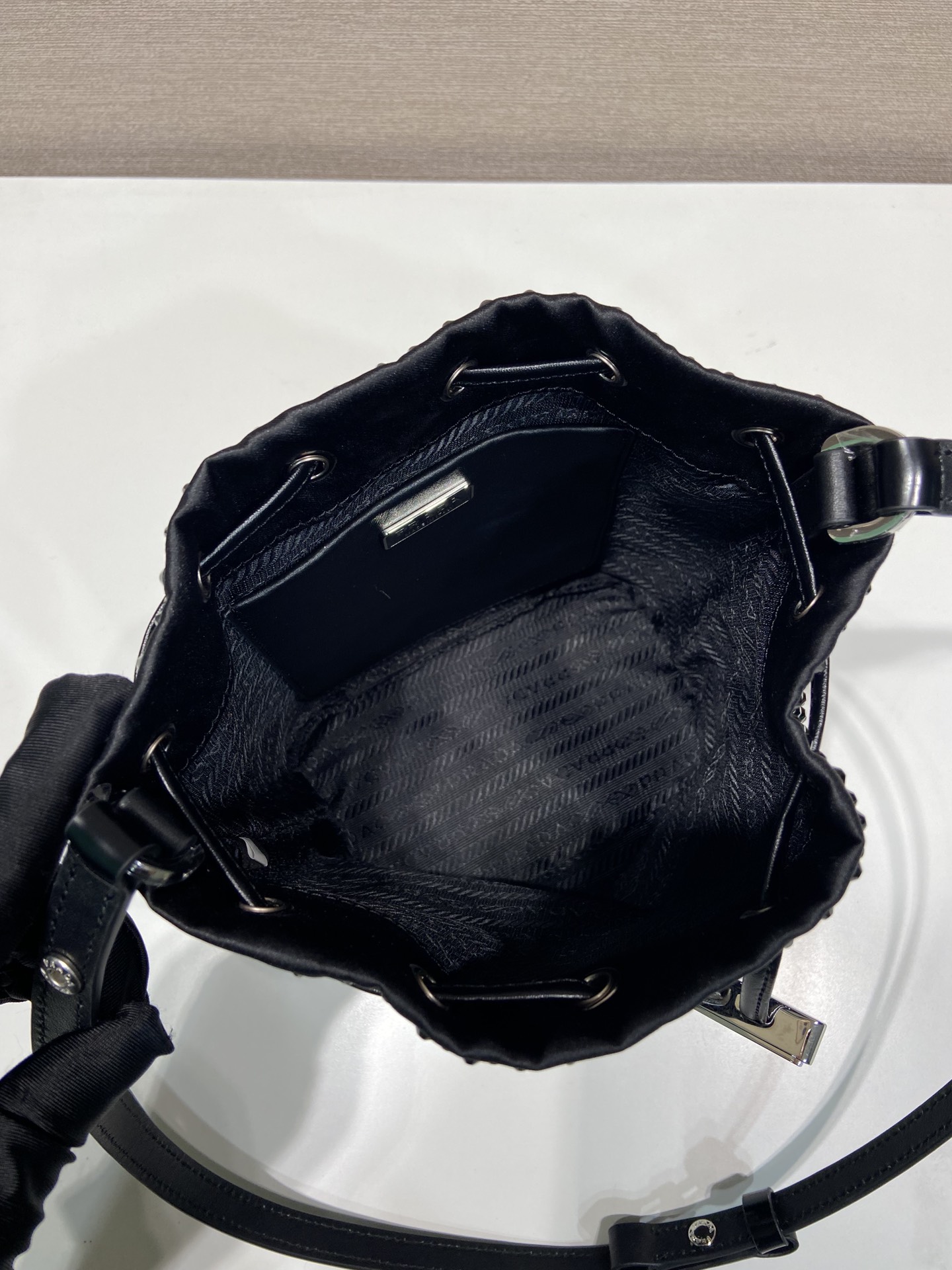 Pra*a satin mini-bag with crystals