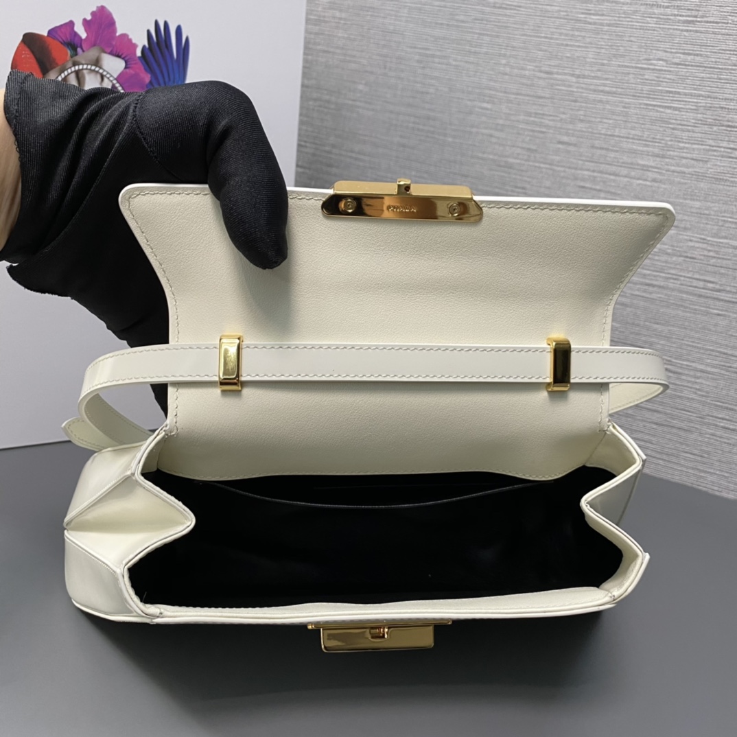 Pra*a medium brushed leather handbag