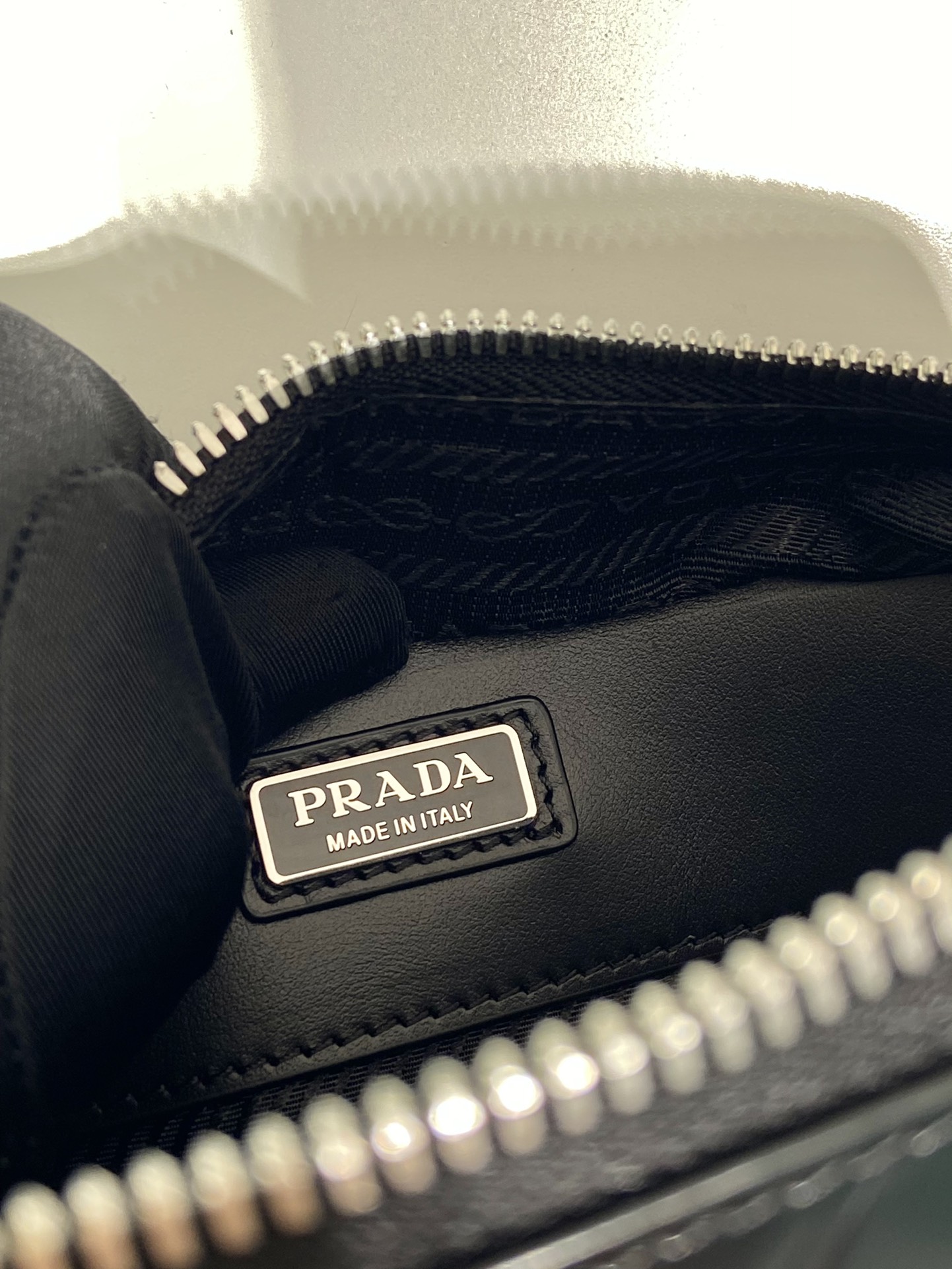 Pra*a small Pra*a brique leather bag